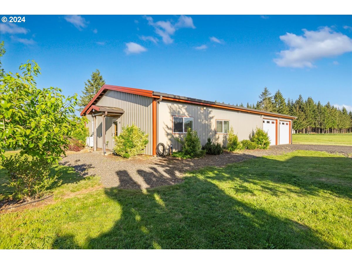 25970 South Wallens Road Estacada, OR 97023 - Photo 20 of 48 a view of a back yard of the house