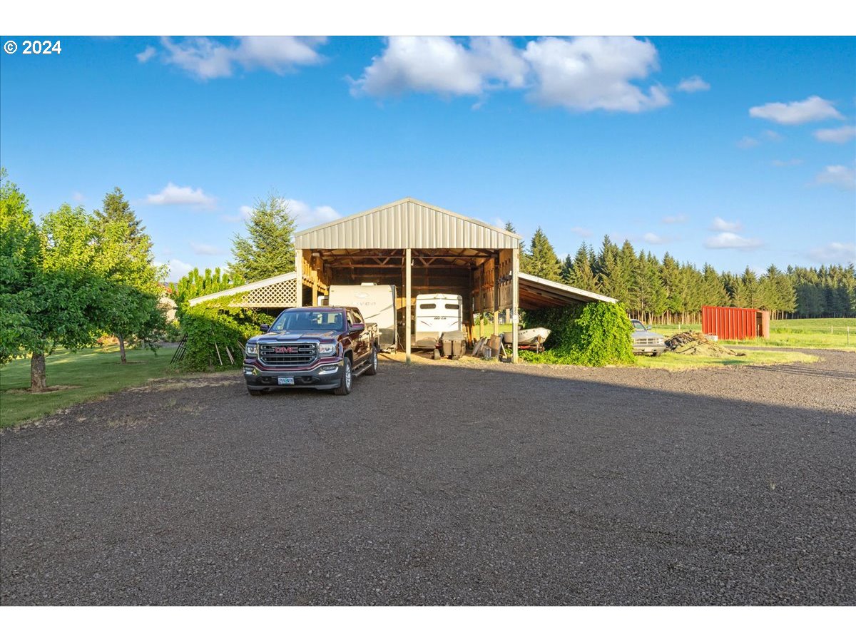 25970 South Wallens Road Estacada, OR 97023 - Photo 28 of 48 a car parked on the side of the road