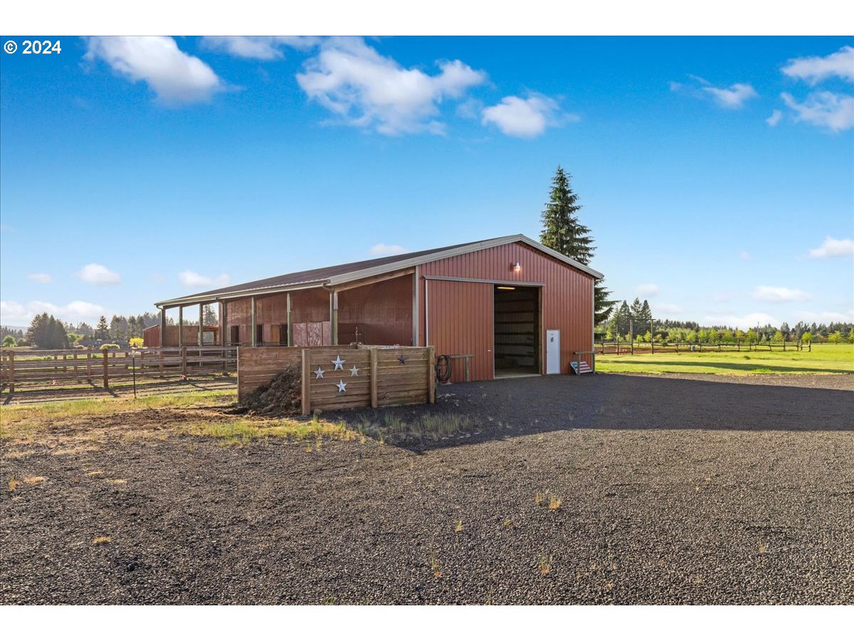 25970 South Wallens Road Estacada, OR 97023 - Photo 32 of 48 a view of a house with a yard