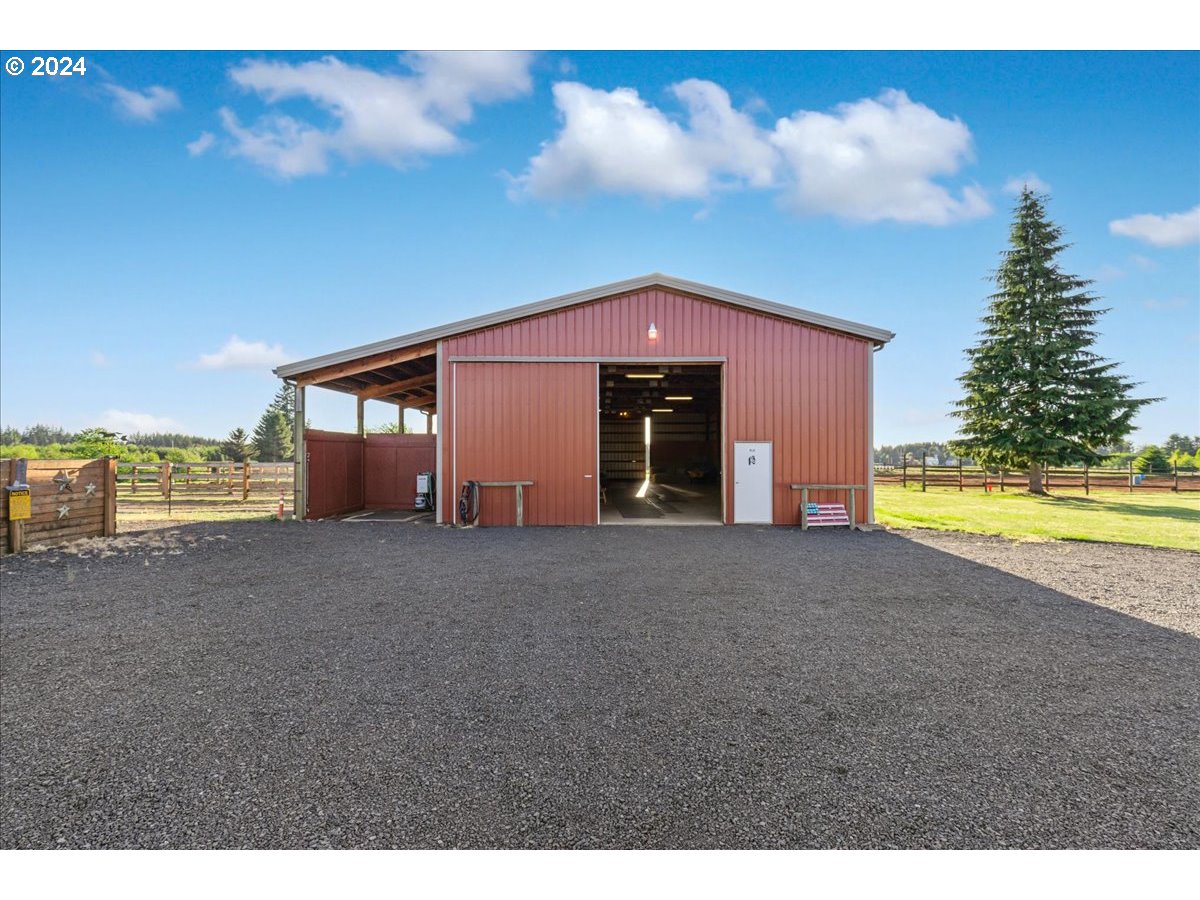 25970 South Wallens Road Estacada, OR 97023 - Photo 33 of 48 a view of a house with a yard and a large tree