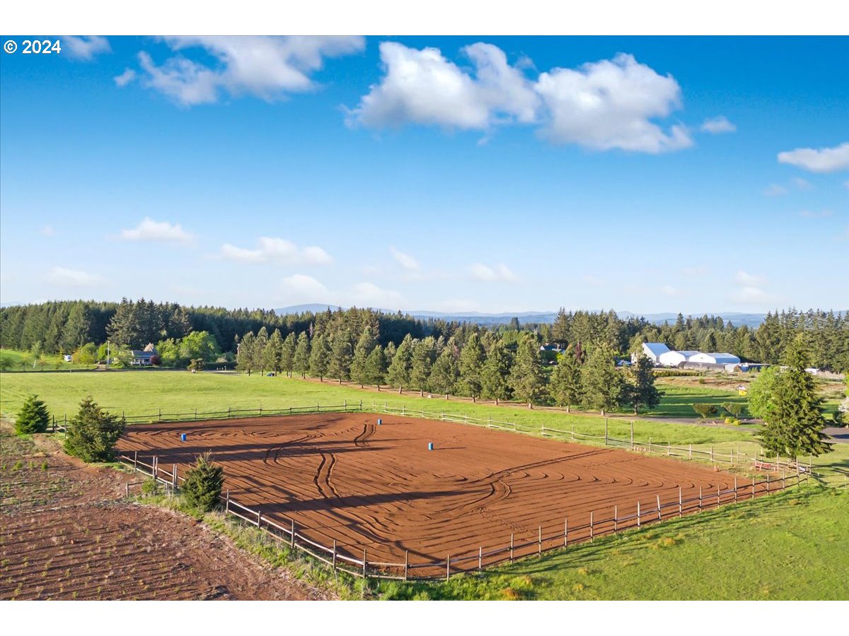 25970 South Wallens Road Estacada, OR 97023 - Photo 42 of 48 a view of a big yard with an outdoor space and seating