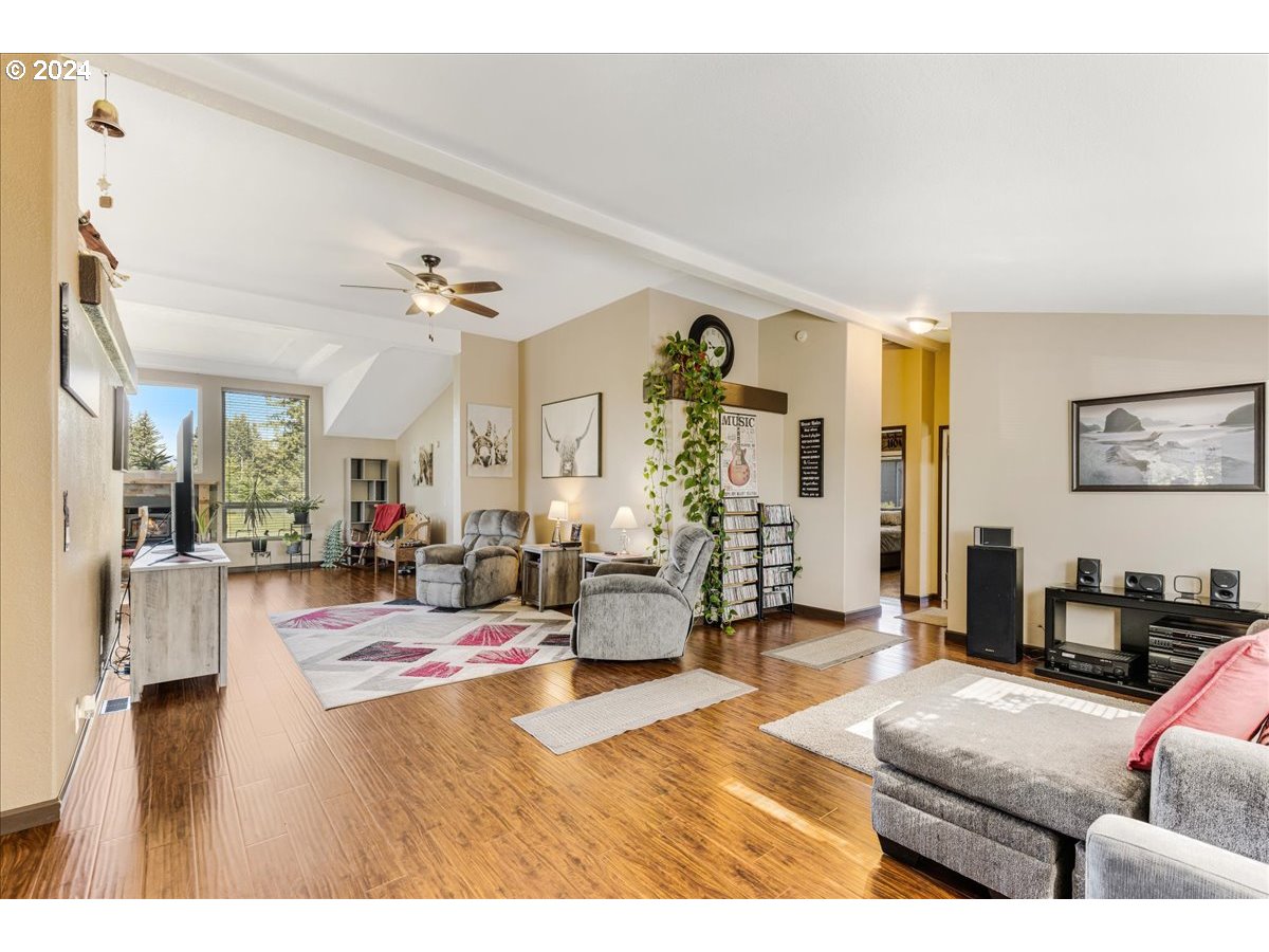 25970 South Wallens Road Estacada, OR 97023 - Photo 5 of 48 a living room with furniture and a wooden floor