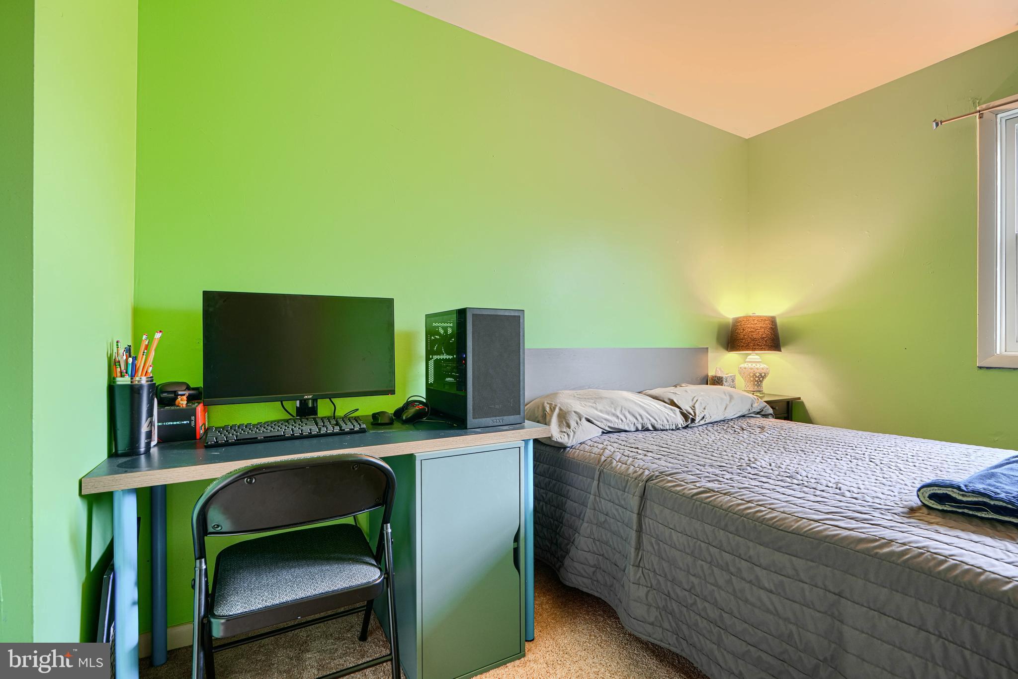 3007 Marlin Drive Riva, MD 21140 - Photo 15 of 34 a bedroom with a bed and a desk