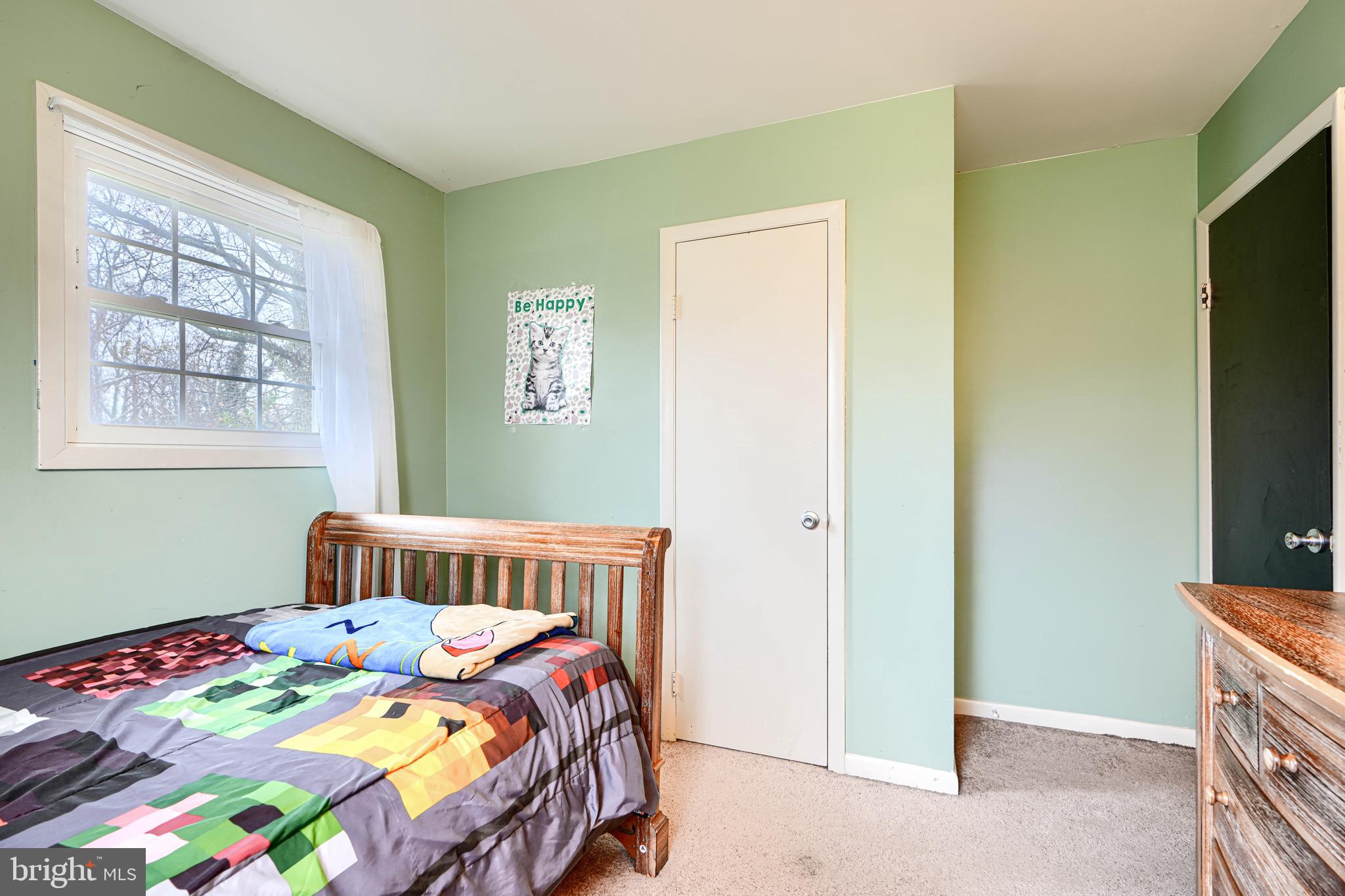 3007 Marlin Drive Riva, MD 21140 - Photo 22 of 34 a bedroom with a bed and a window