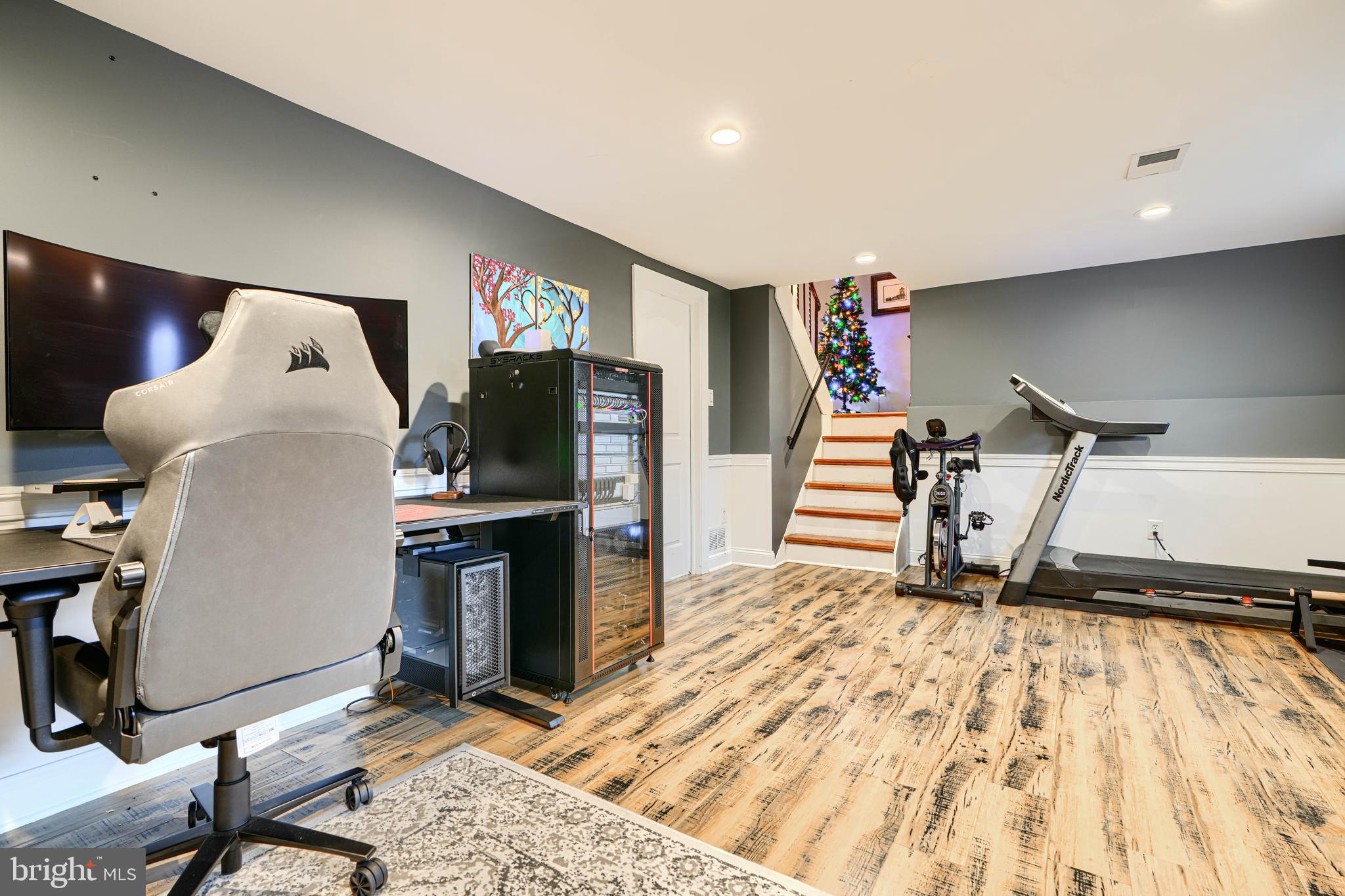 3007 Marlin Drive Riva, MD 21140 - Photo 28 of 34 a room with wooden floor and furniture