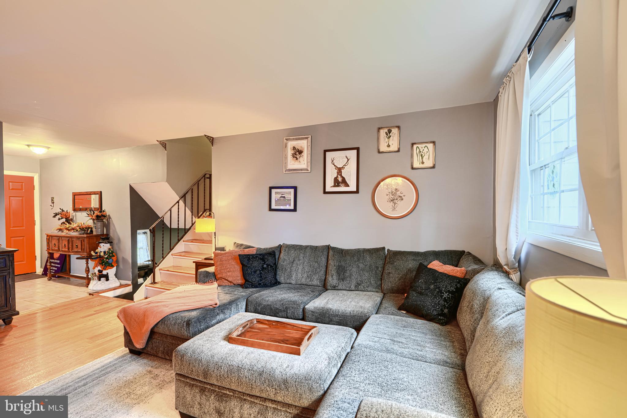 3007 Marlin Drive Riva, MD 21140 - Photo 7 of 34 a living room with furniture and a lamp