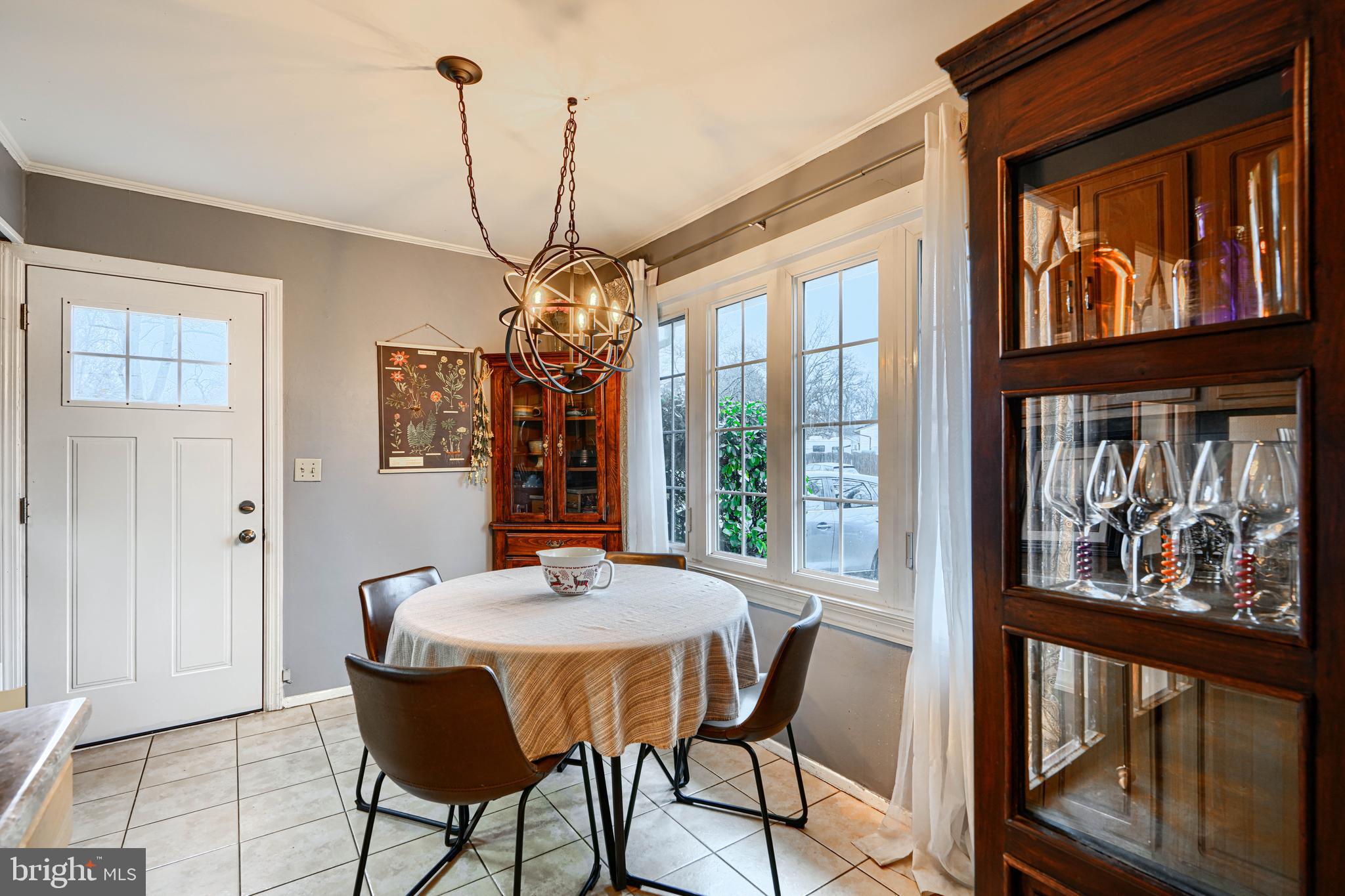 3007 Marlin Drive Riva, MD 21140 - Photo 10 of 34 a view of a dining room with furniture a chandelier and window