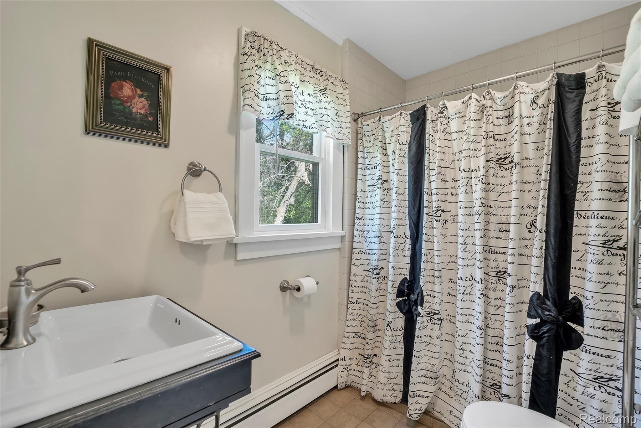 2074 Covert Road Burton, MI 48509 - Photo 17 of 28 covert bathroom .jpg