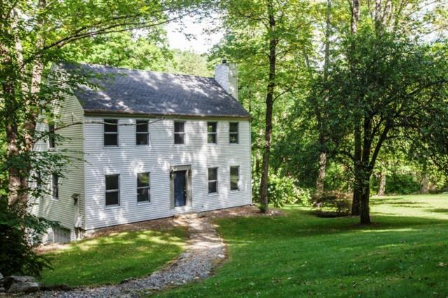 16 Stony Brook Road Kent, CT 06757 - Photo 1 of 1 a front view of a house with a garden