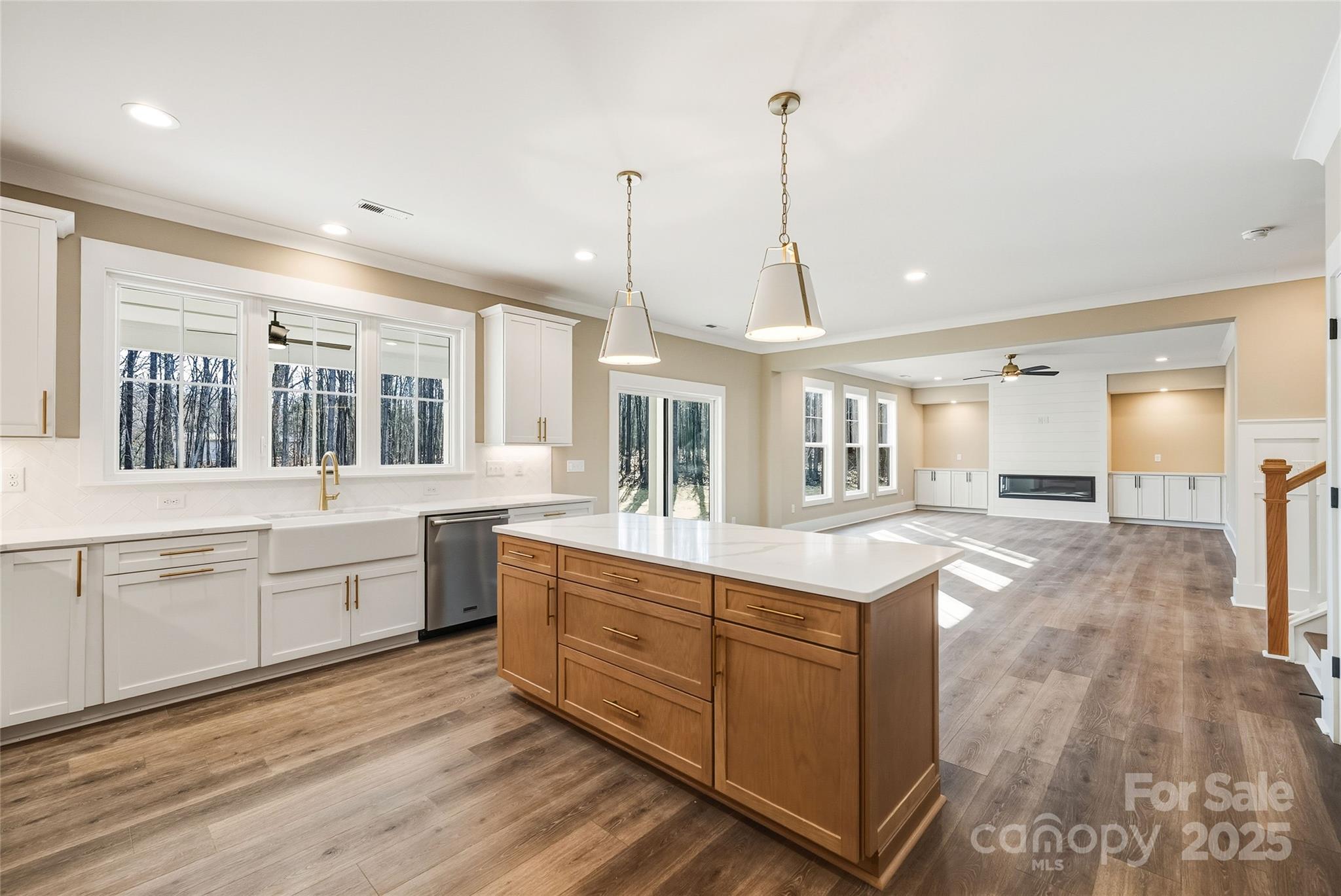 1913 Snyders Store Road, Unit 5 Wingate, NC 28174 - Photo 12 of 48 a large kitchen with kitchen island lots of counter space a sink and appliances