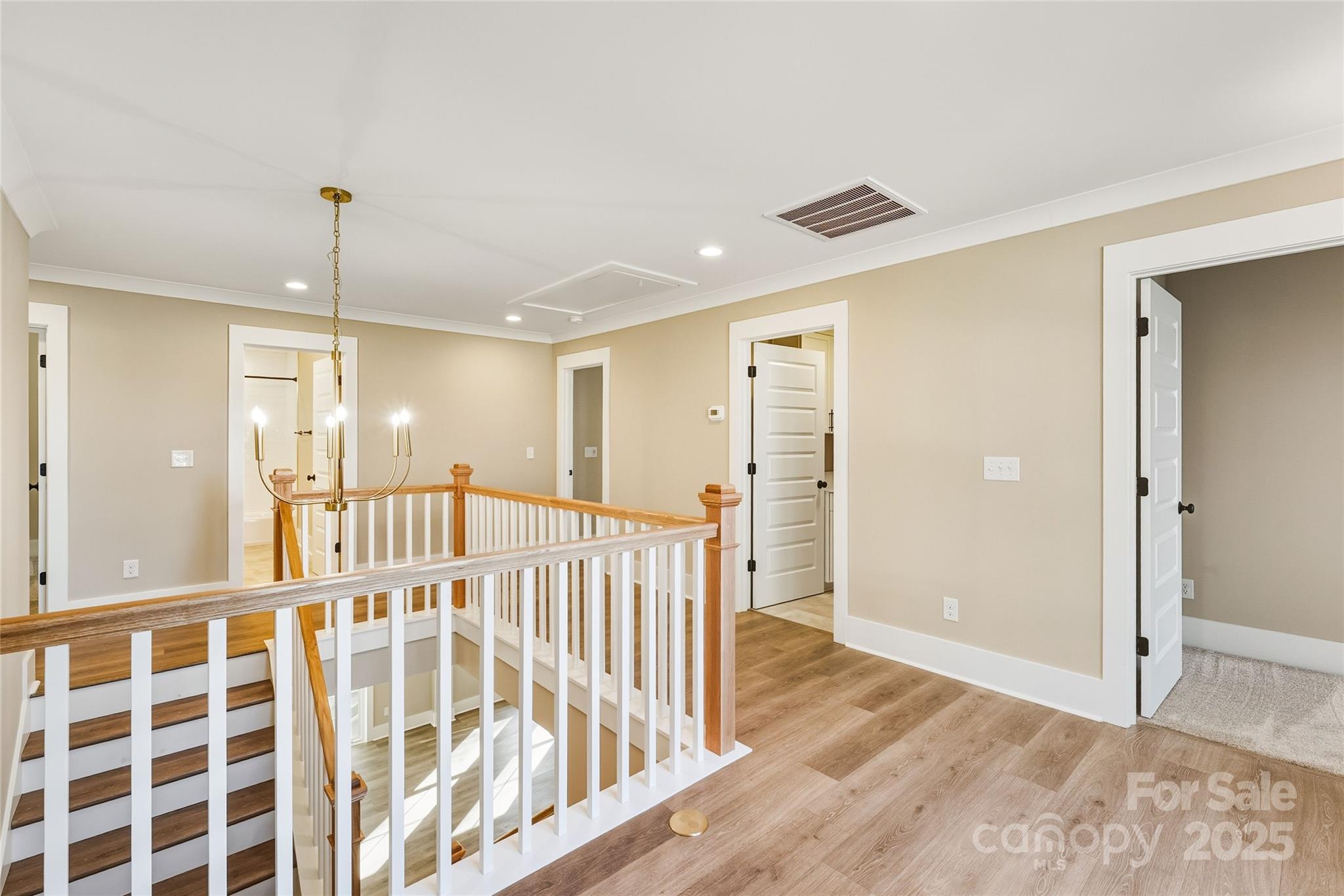 1913 Snyders Store Road, Unit 5 Wingate, NC 28174 - Photo 19 of 48 a view of entryway with wooden floor