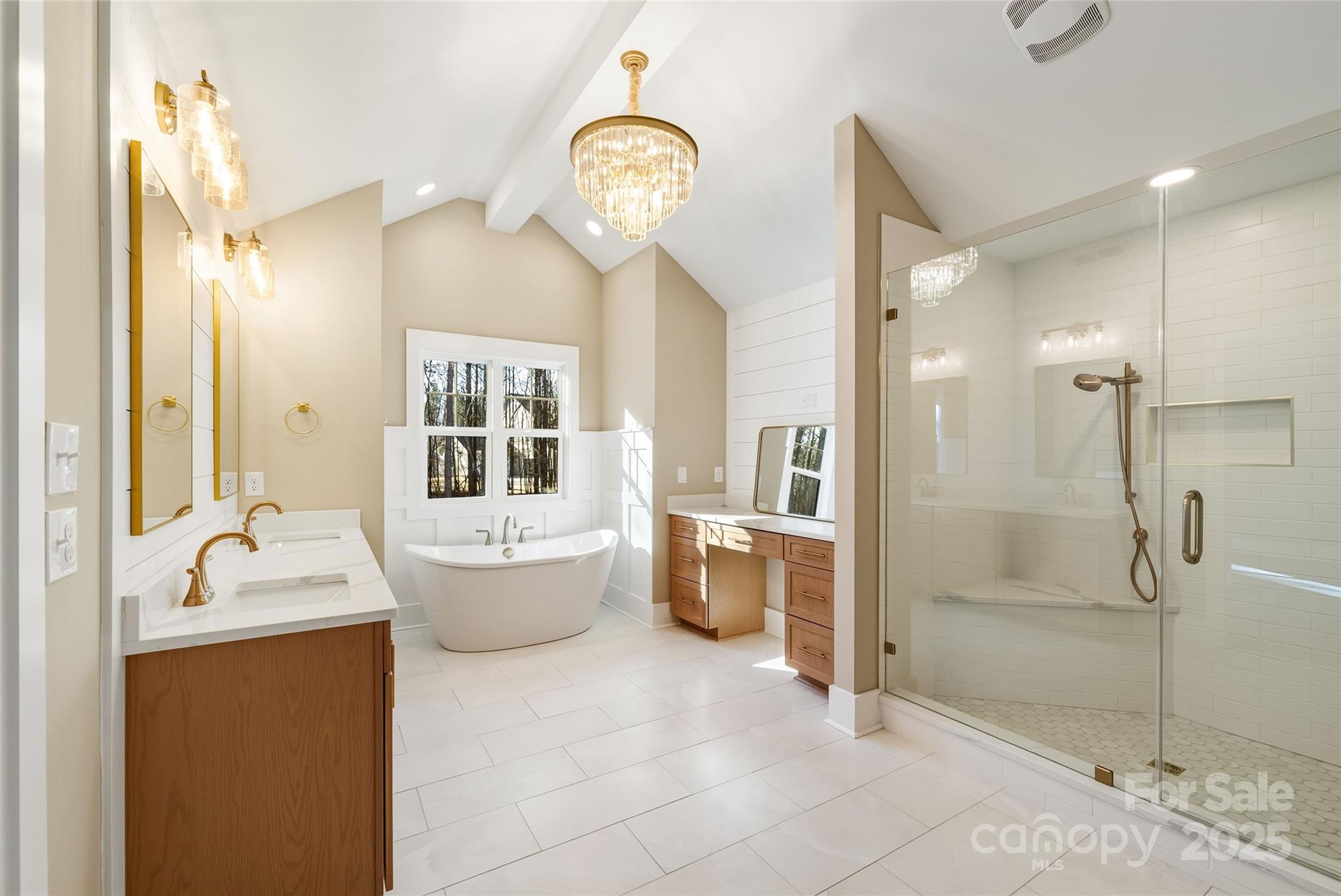 1913 Snyders Store Road, Unit 5 Wingate, NC 28174 - Photo 26 of 48 a spacious bathroom with a granite countertop sink mirror and bathtub