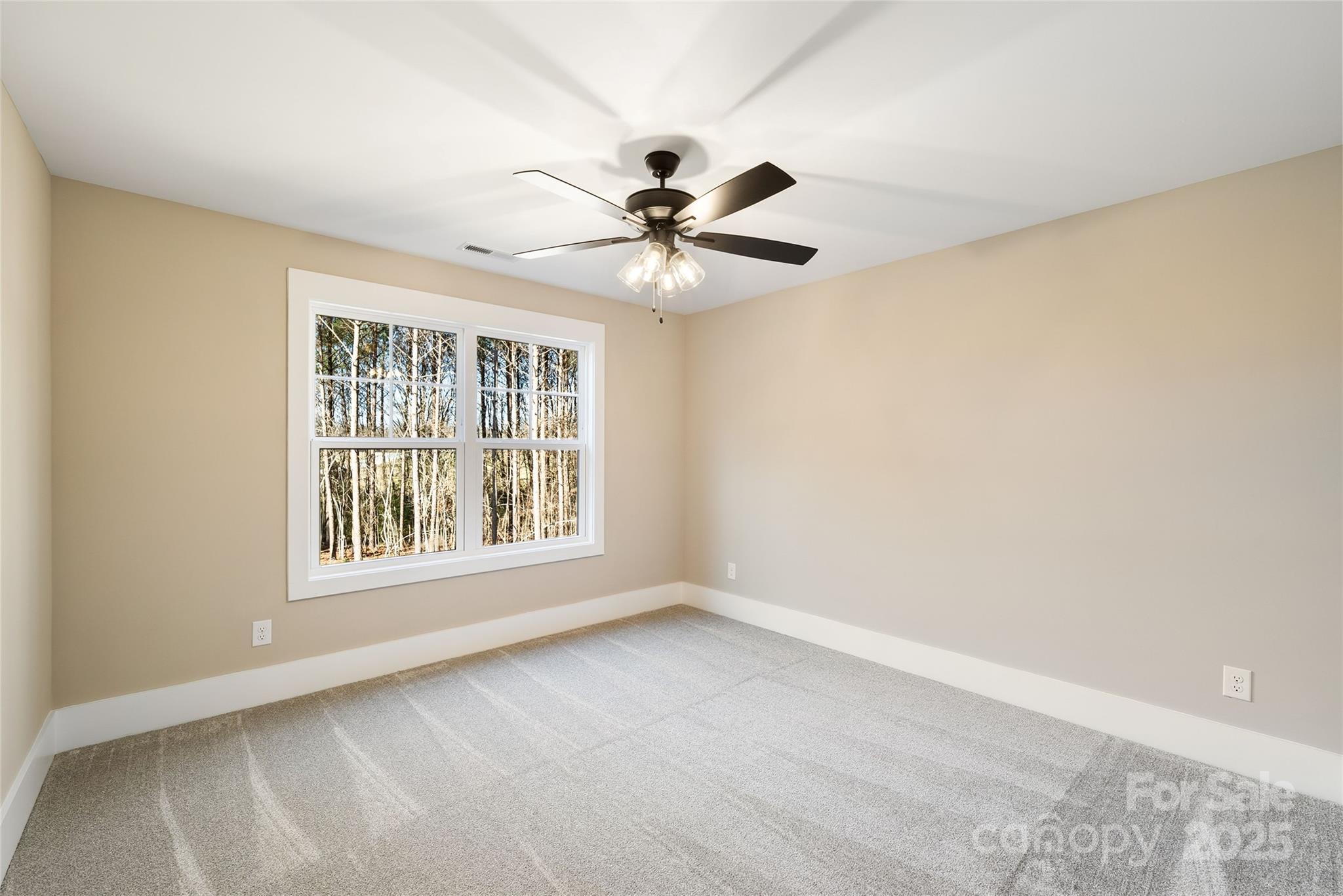 1913 Snyders Store Road, Unit 5 Wingate, NC 28174 - Photo 33 of 48 a view of an empty room with a window