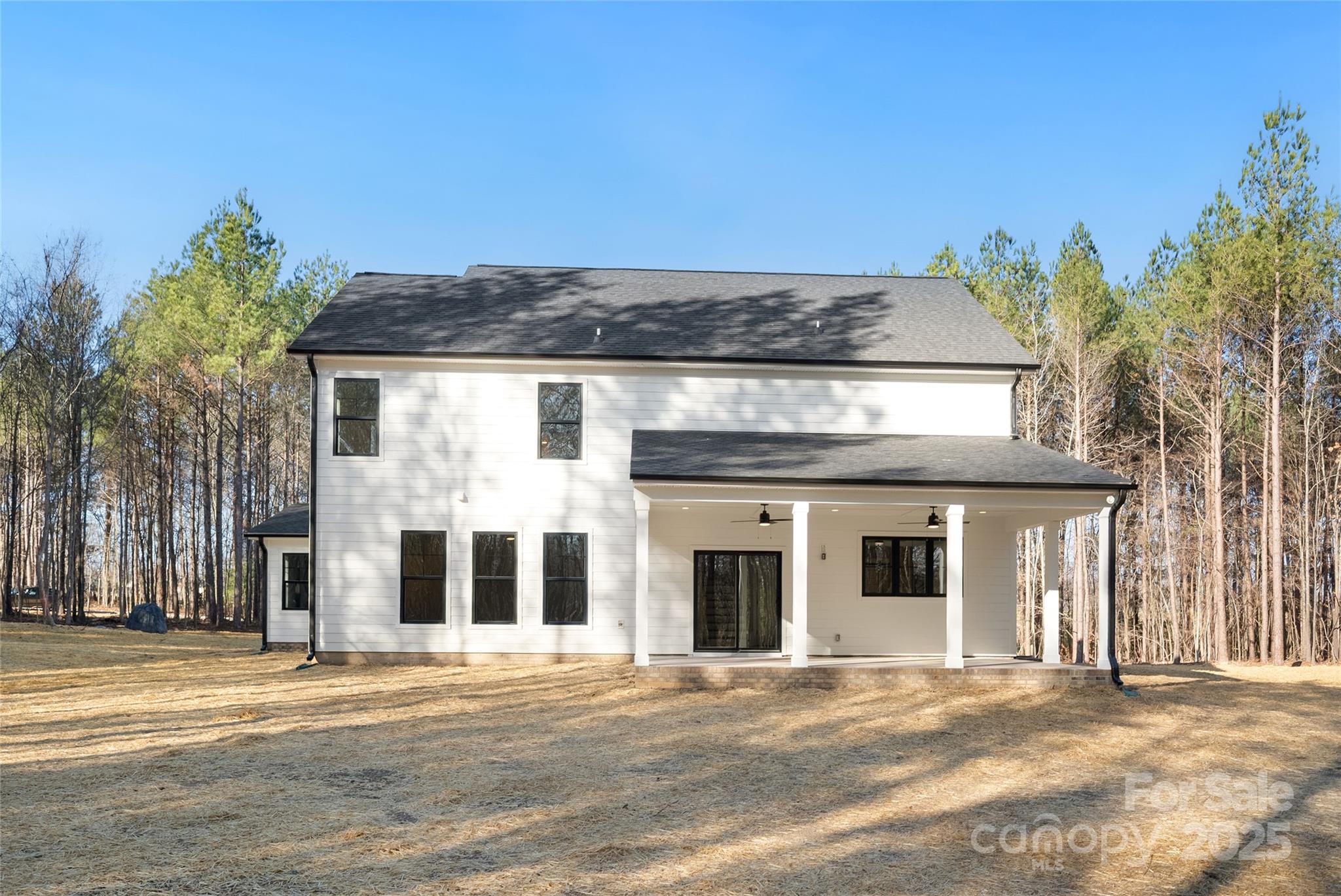 1913 Snyders Store Road, Unit 5 Wingate, NC 28174 - Photo 45 of 48 a front view of a house with a garden