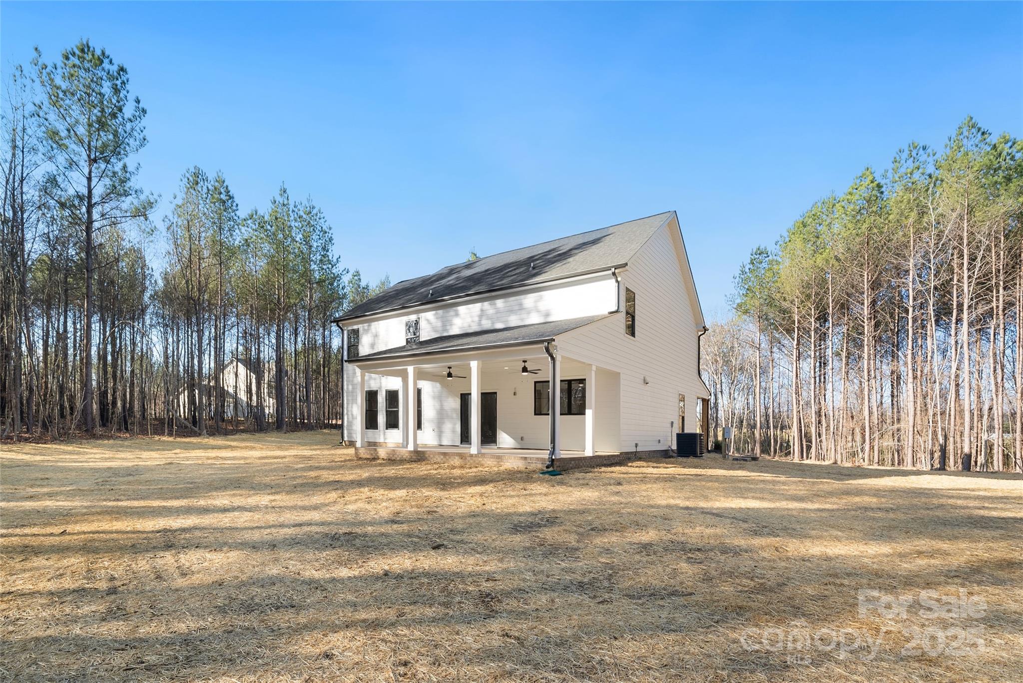 1913 Snyders Store Road, Unit 5 Wingate, NC 28174 - Photo 46 of 48 a view of a house with a outdoor space