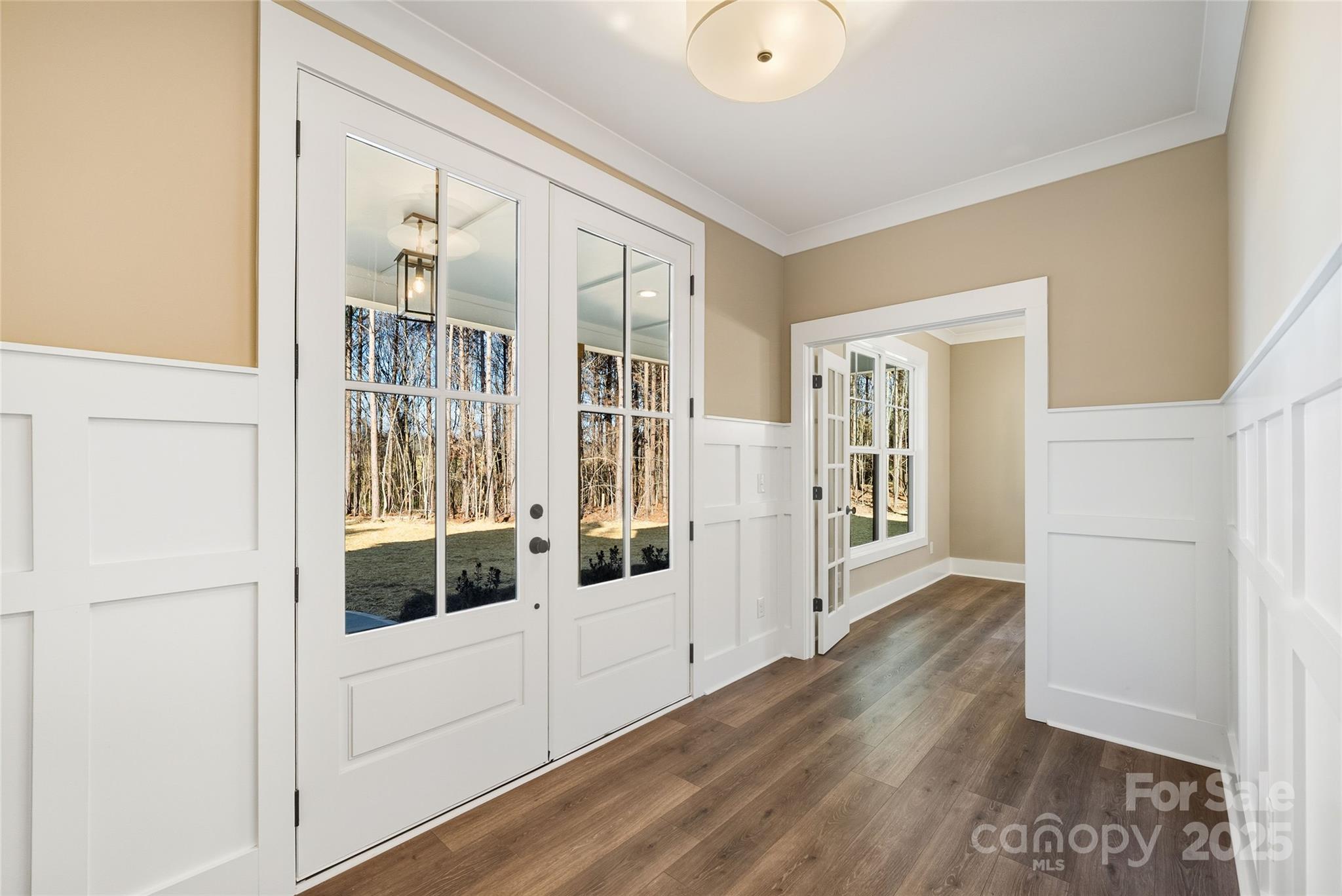 1913 Snyders Store Road, Unit 5 Wingate, NC 28174 - Photo 5 of 48 a view of livingroom with furniture wooden floor and window