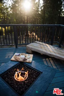 a view of a balcony with lake view and wooden floor