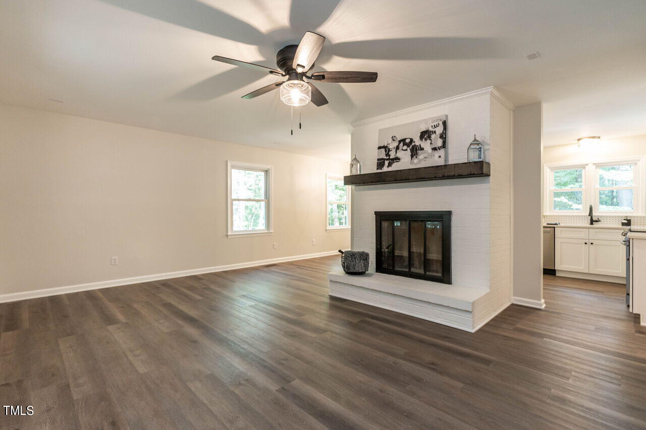 1940 Hilltop Road Raleigh, NC 27610 - Photo 8 of 25 007-1280x960-living-room