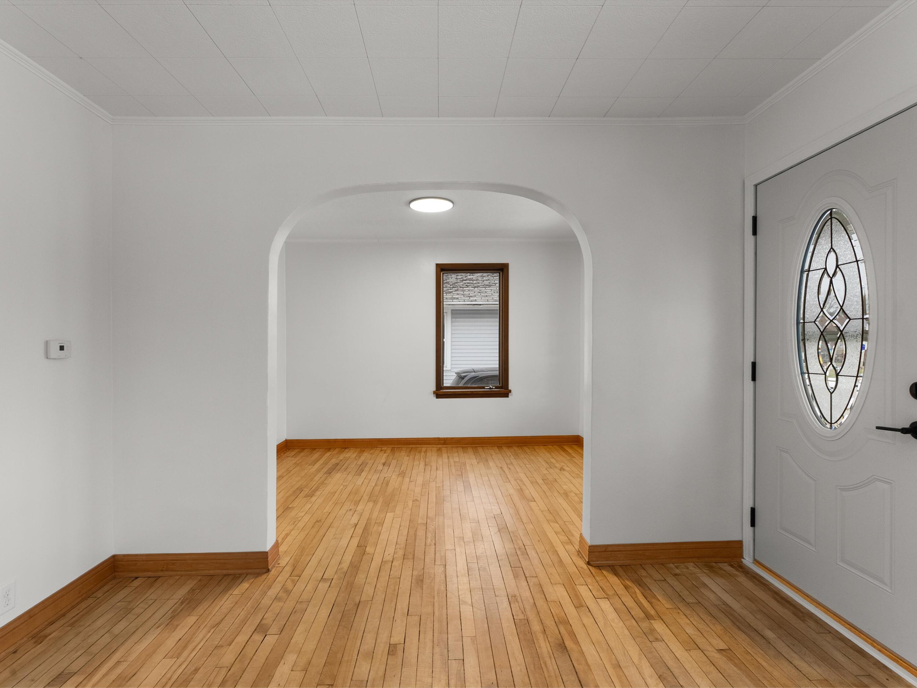 2323 9th Place Two Rivers, WI 54241 - Photo 10 of 35 Bonus archway room perfect for a home office