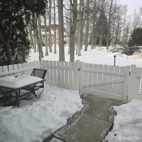 a view of a backyard with sitting area