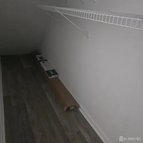 a view of a room with racks on the wall