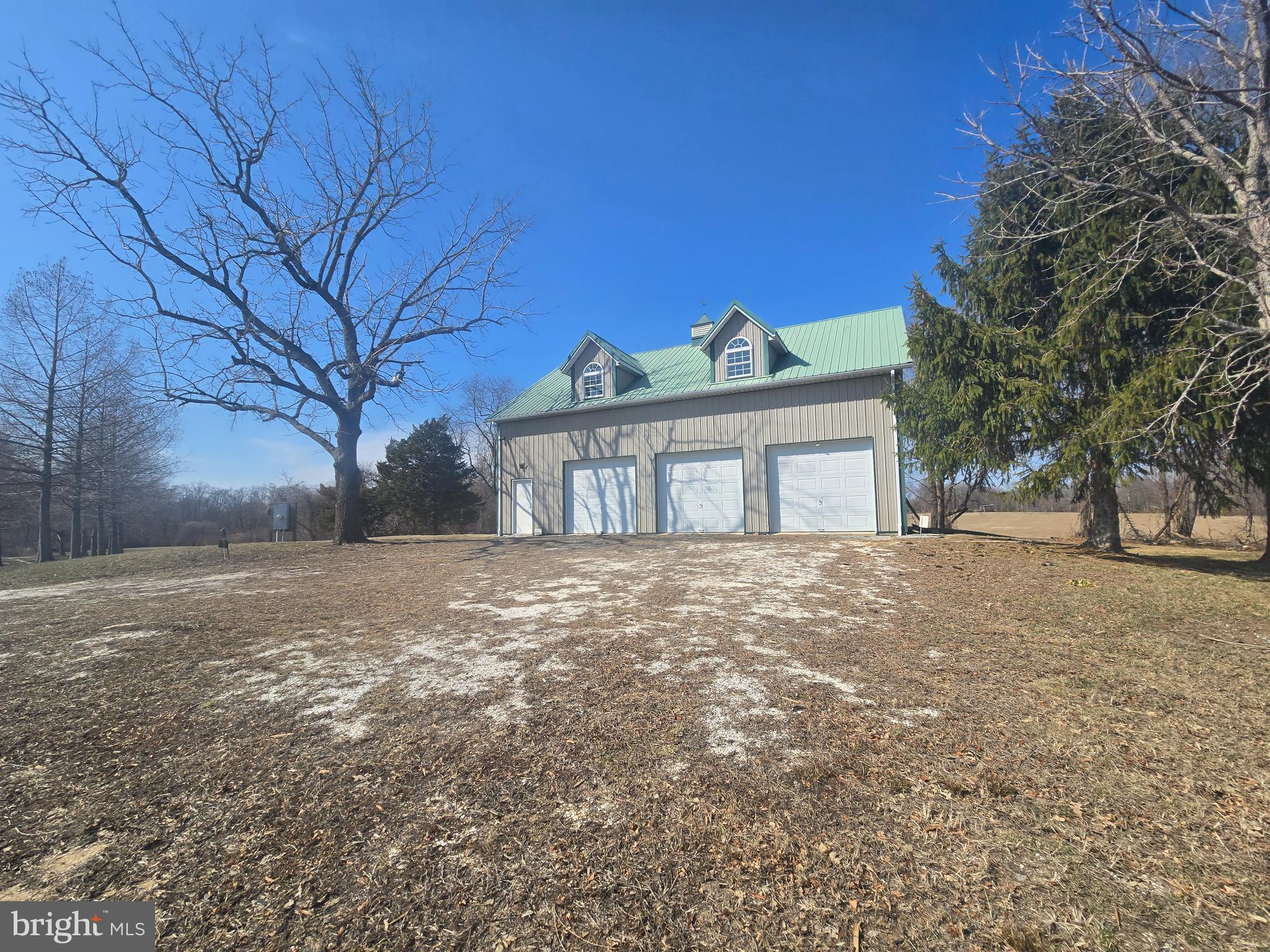 605 Gum Tree Corner Road Bridgeton, NJ 08302 - Photo 7 of 20 a view of a house with a large tree and a yard