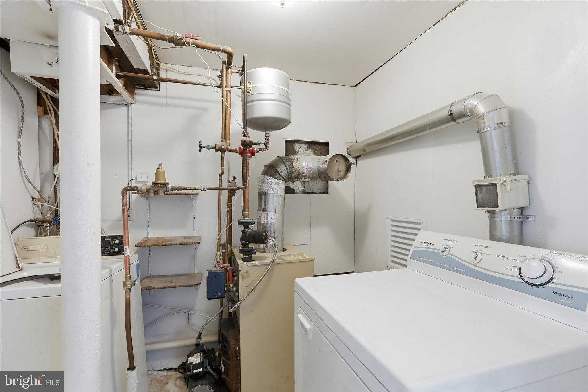 337 Main Street Tullytown, PA 19007 - Photo 12 of 33 a utility room with dryer and washer