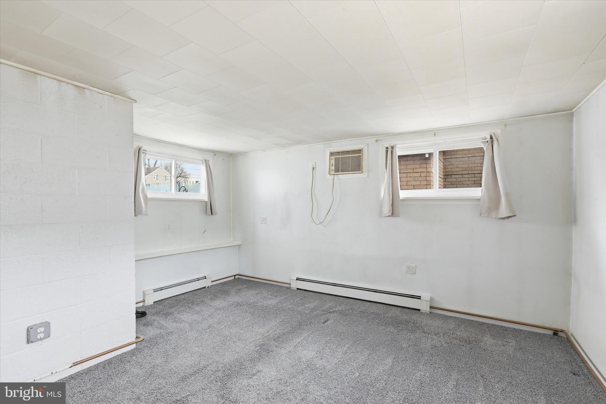 337 Main Street Tullytown, PA 19007 - Photo 13 of 33 an empty room with windows