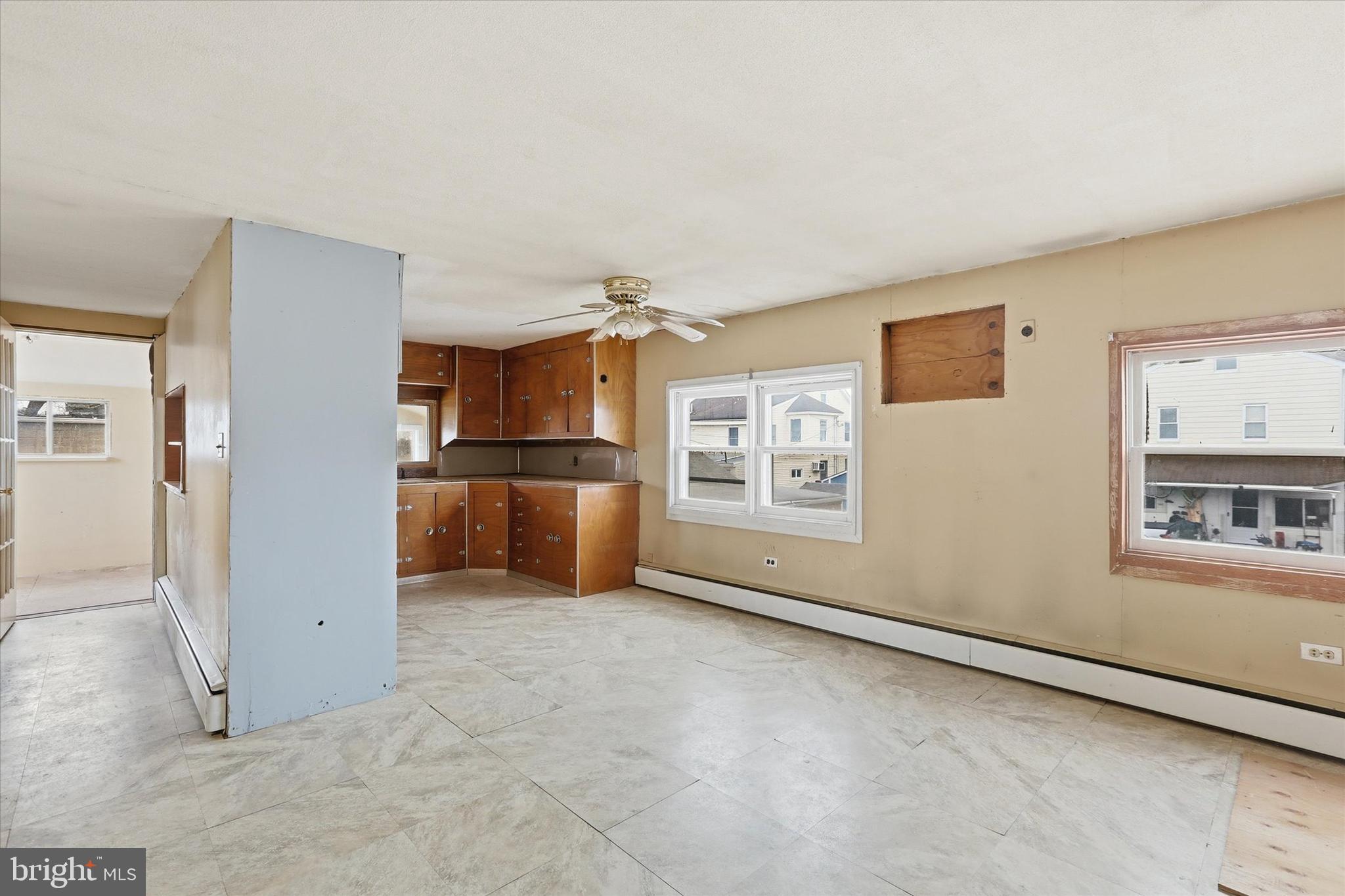 337 Main Street Tullytown, PA 19007 - Photo 20 of 33 a view of an empty room with a kitchen