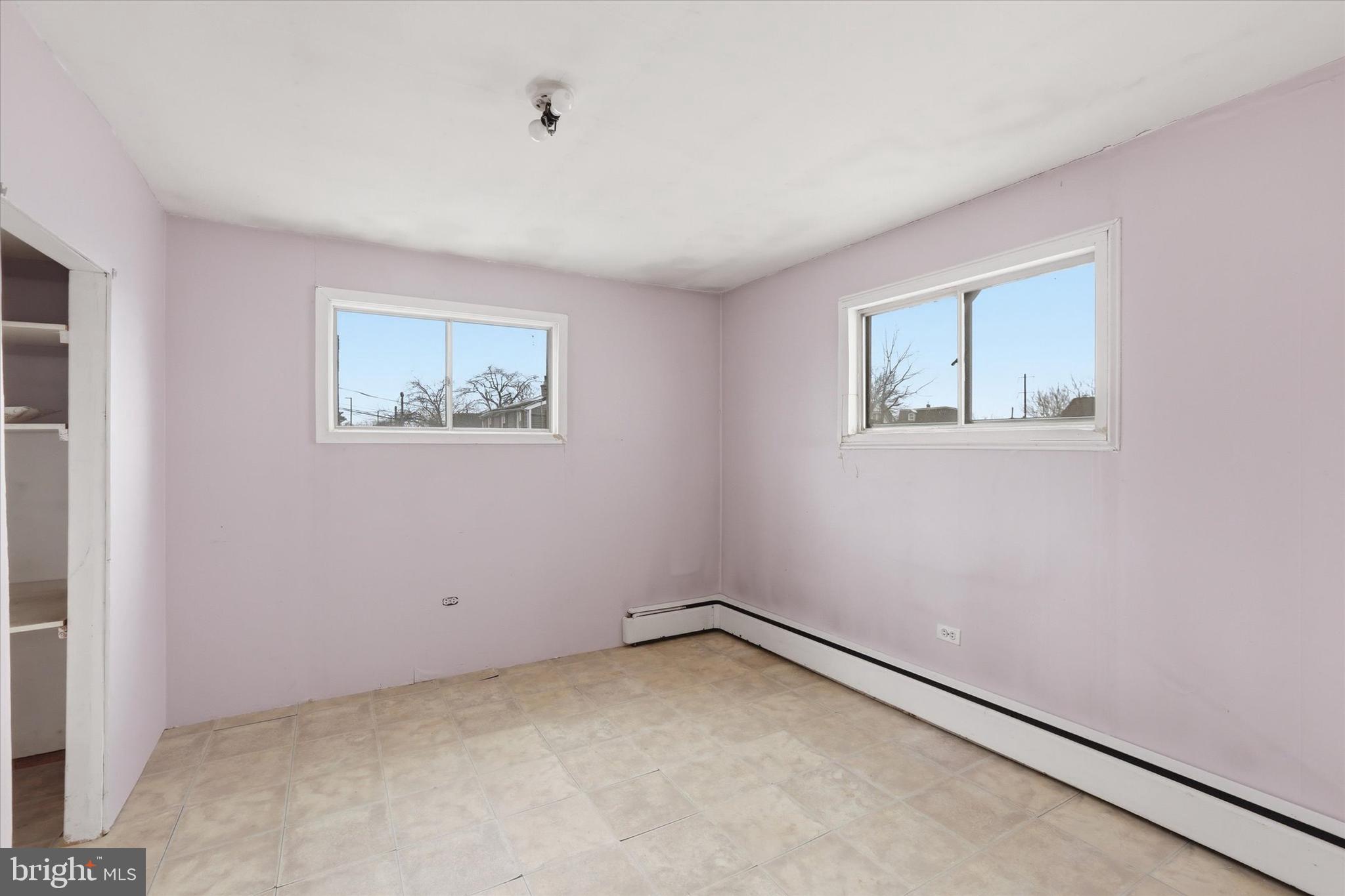337 Main Street Tullytown, PA 19007 - Photo 25 of 33 a view of an empty room with a window