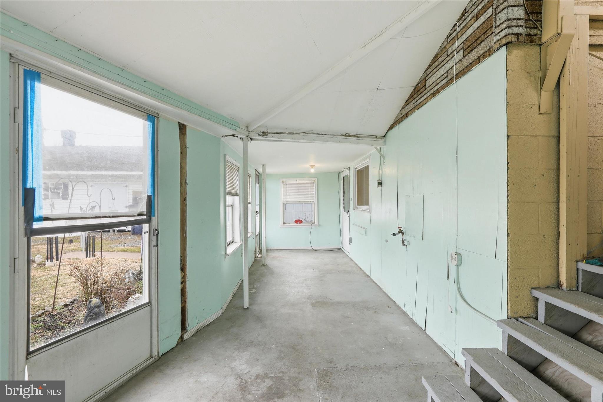 337 Main Street Tullytown, PA 19007 - Photo 30 of 33 a view of hallway with furniture and windows