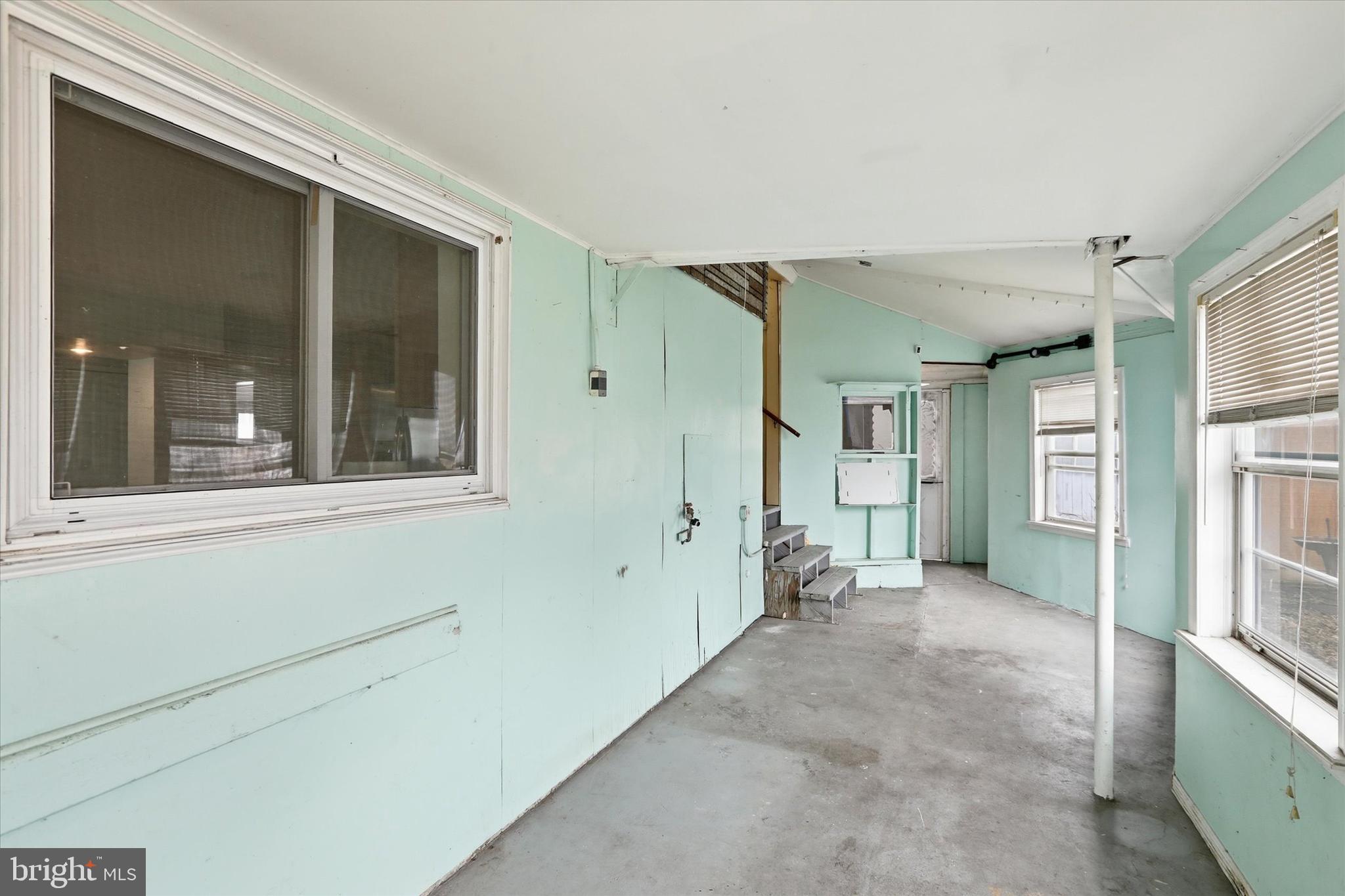 337 Main Street Tullytown, PA 19007 - Photo 31 of 33 a view of empty room with large windows