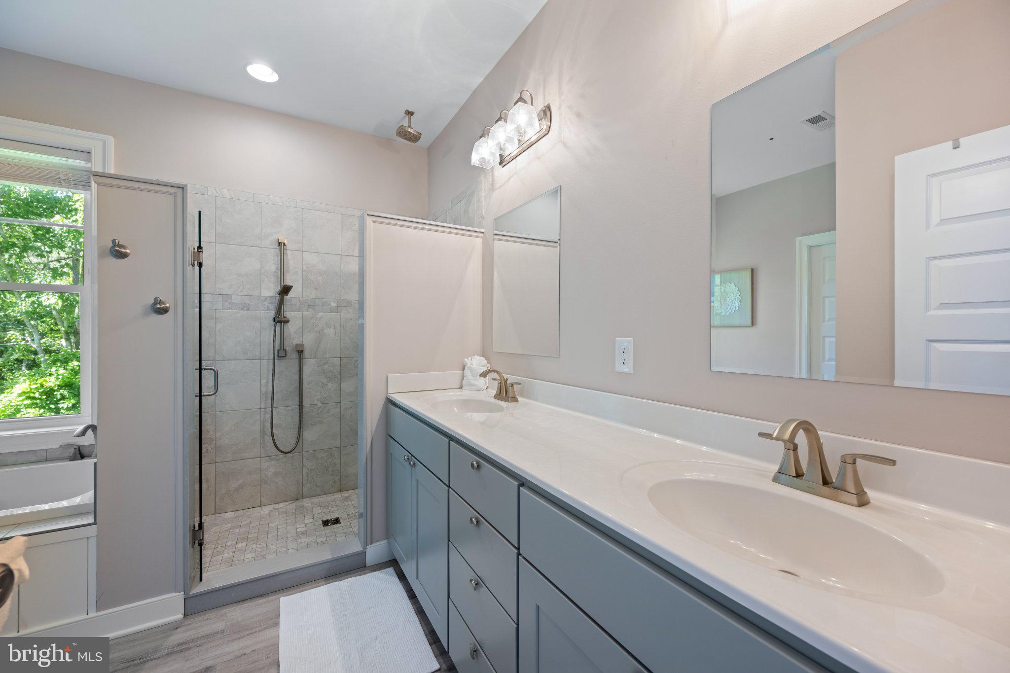 402 Salt Pond Road Bethany Beach, DE 19930 - Photo 27 of 55 Serene modern bathroom retreat.