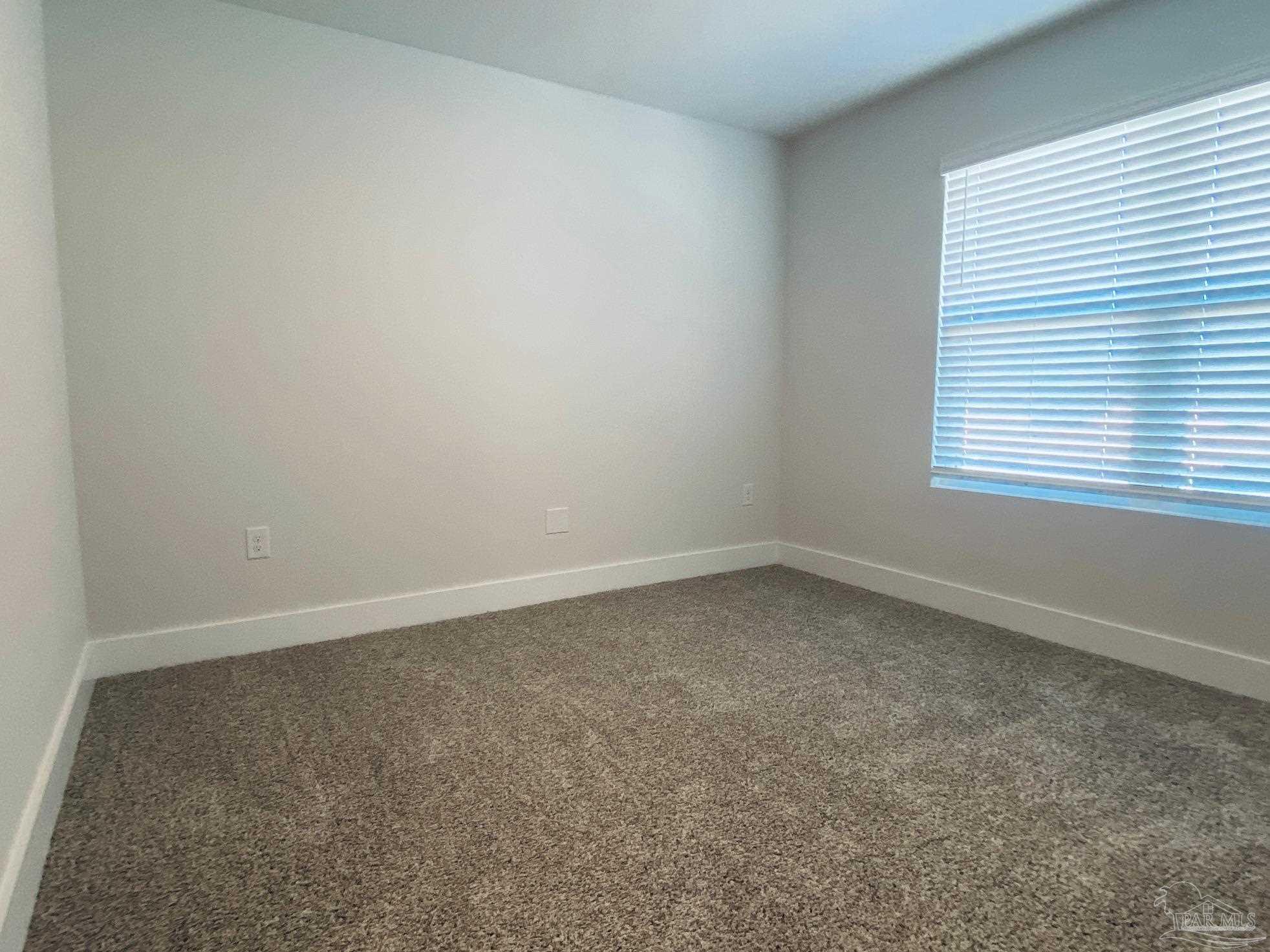 3021 Serviceberry Road Cantonment, FL 32533 - Photo 16 of 21 an empty room with a window