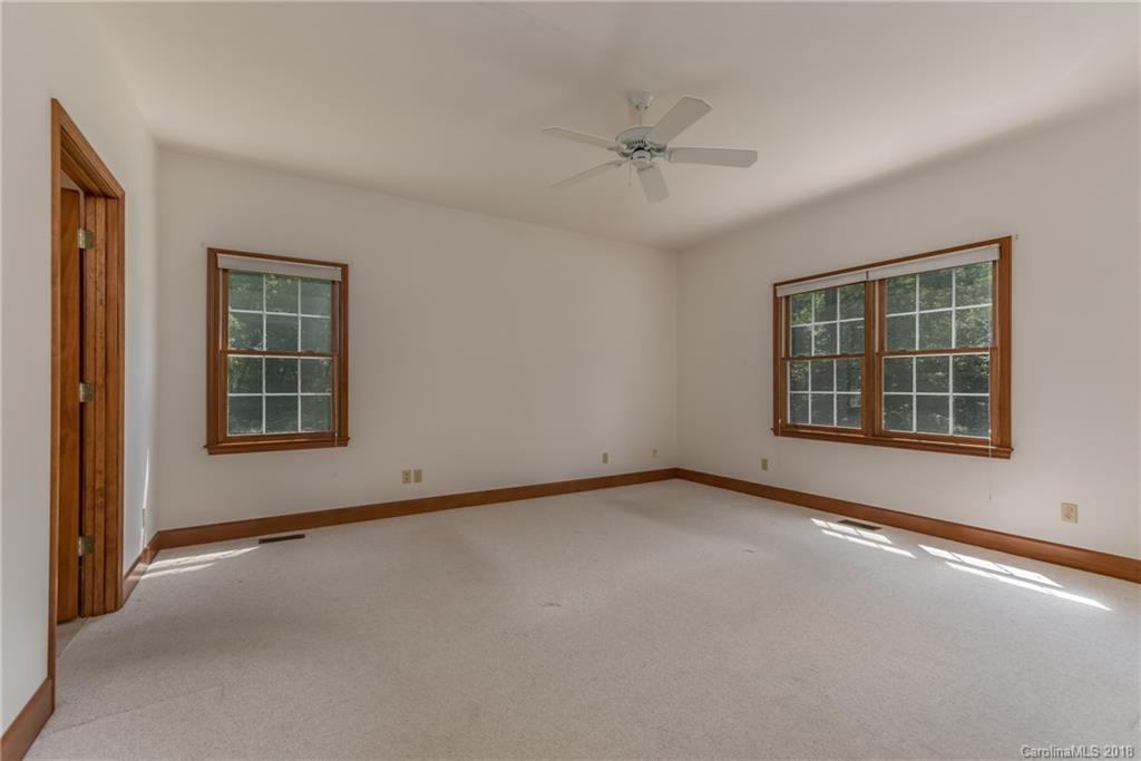 661 Henderson Road Tryon, NC 28782 - Photo 13 of 33 a view of an empty room with a window