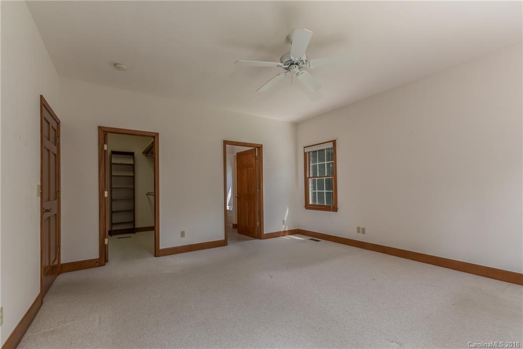 661 Henderson Road Tryon, NC 28782 - Photo 14 of 33 a view of an empty room with a window