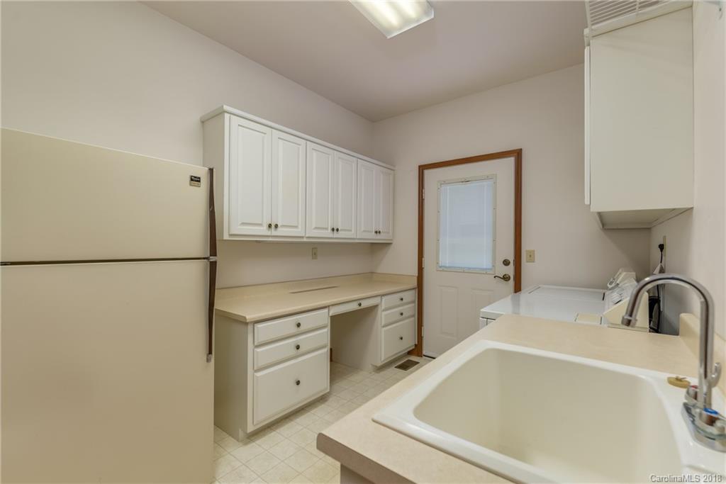 661 Henderson Road Tryon, NC 28782 - Photo 22 of 33 a bathroom with a sink and a bathtub