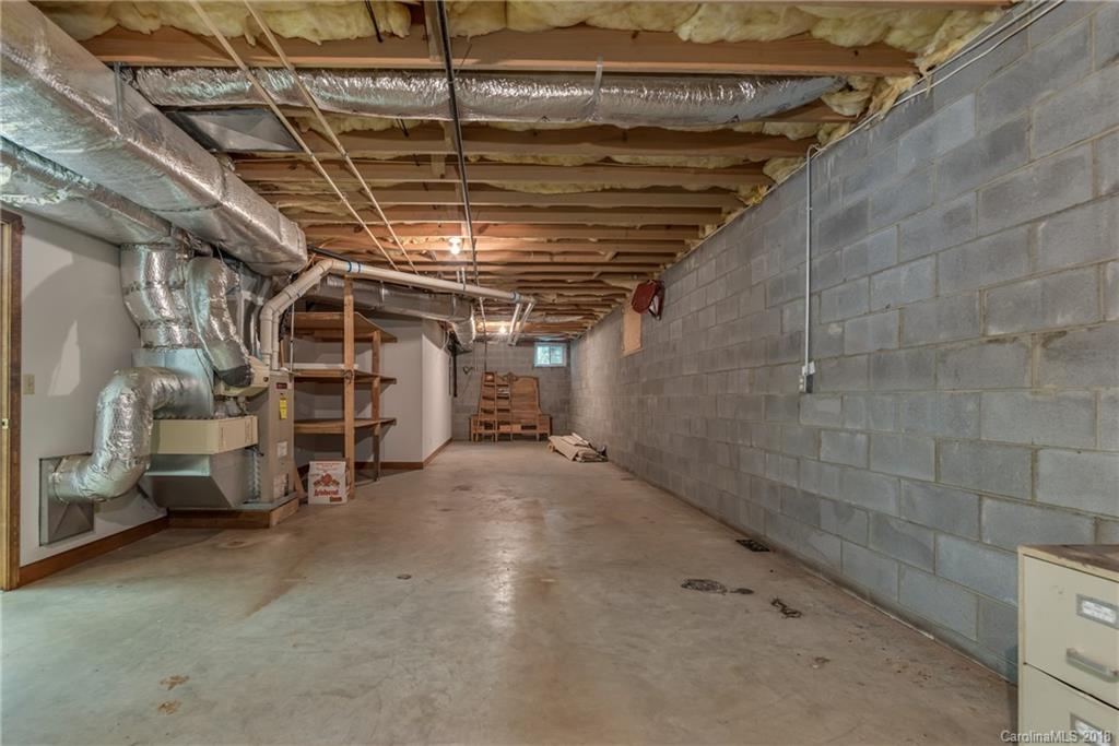 661 Henderson Road Tryon, NC 28782 - Photo 24 of 33 a view of empty room with wooden ceiling