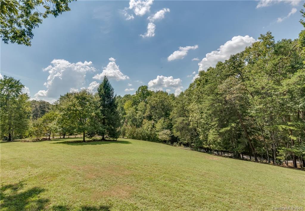 661 Henderson Road Tryon, NC 28782 - Photo 27 of 33 a view of a green yard