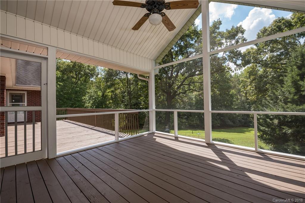 661 Henderson Road Tryon, NC 28782 - Photo 5 of 33 a view of outdoor space with wooden floor and backyard