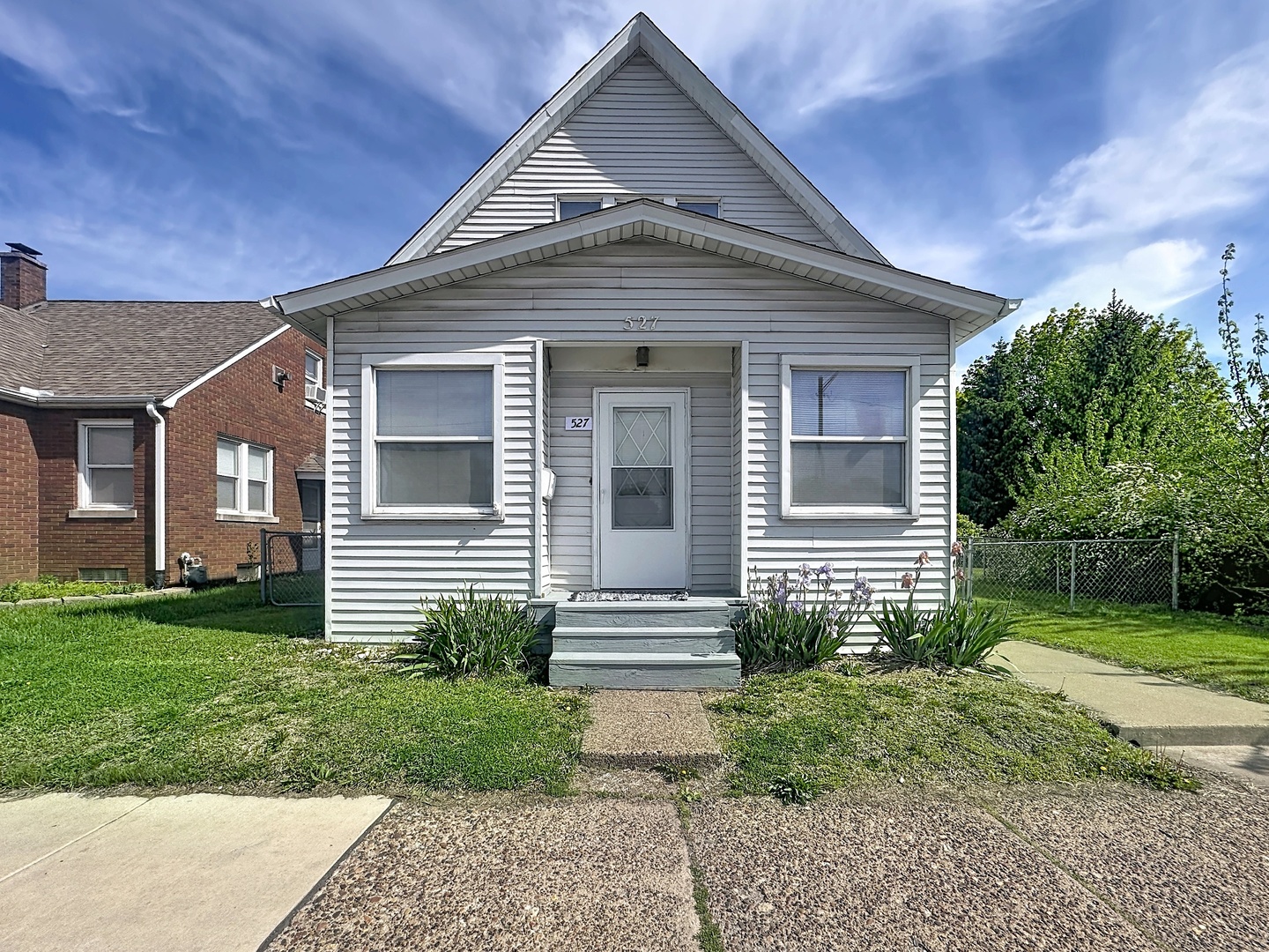 527 19th Avenue Moline, IL 61265 - Photo 1 of 21 a view of a house with a yard