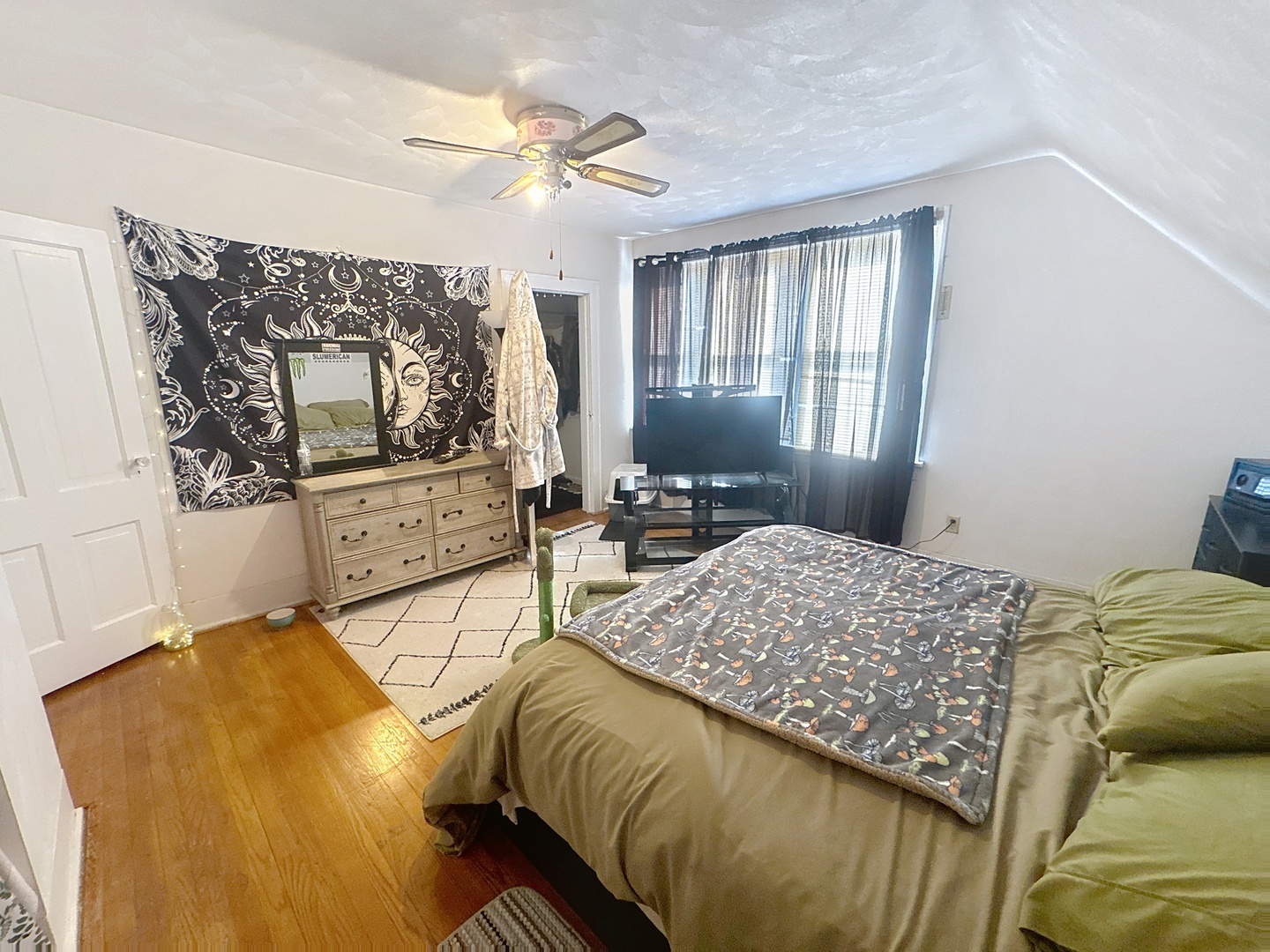 527 19th Avenue Moline, IL 61265 - Photo 11 of 22 a bedroom with a bed a window and dresser