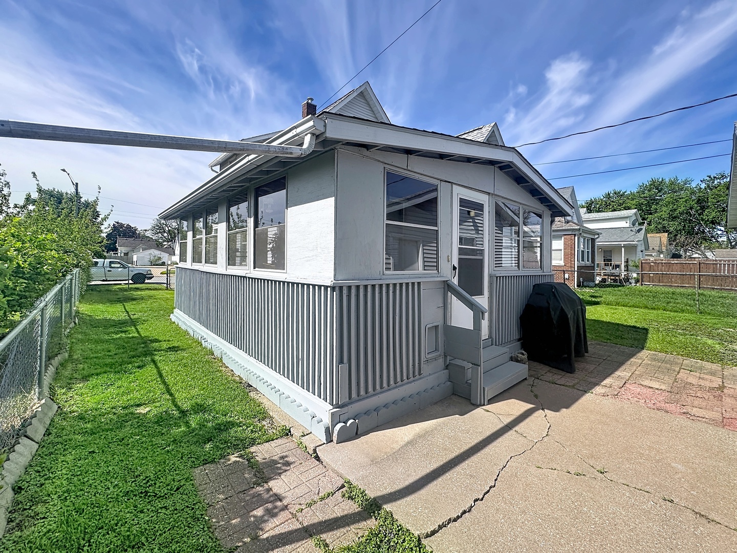 527 19th Avenue Moline, IL 61265 - Photo 19 of 21 a view of a house with backyard and porch