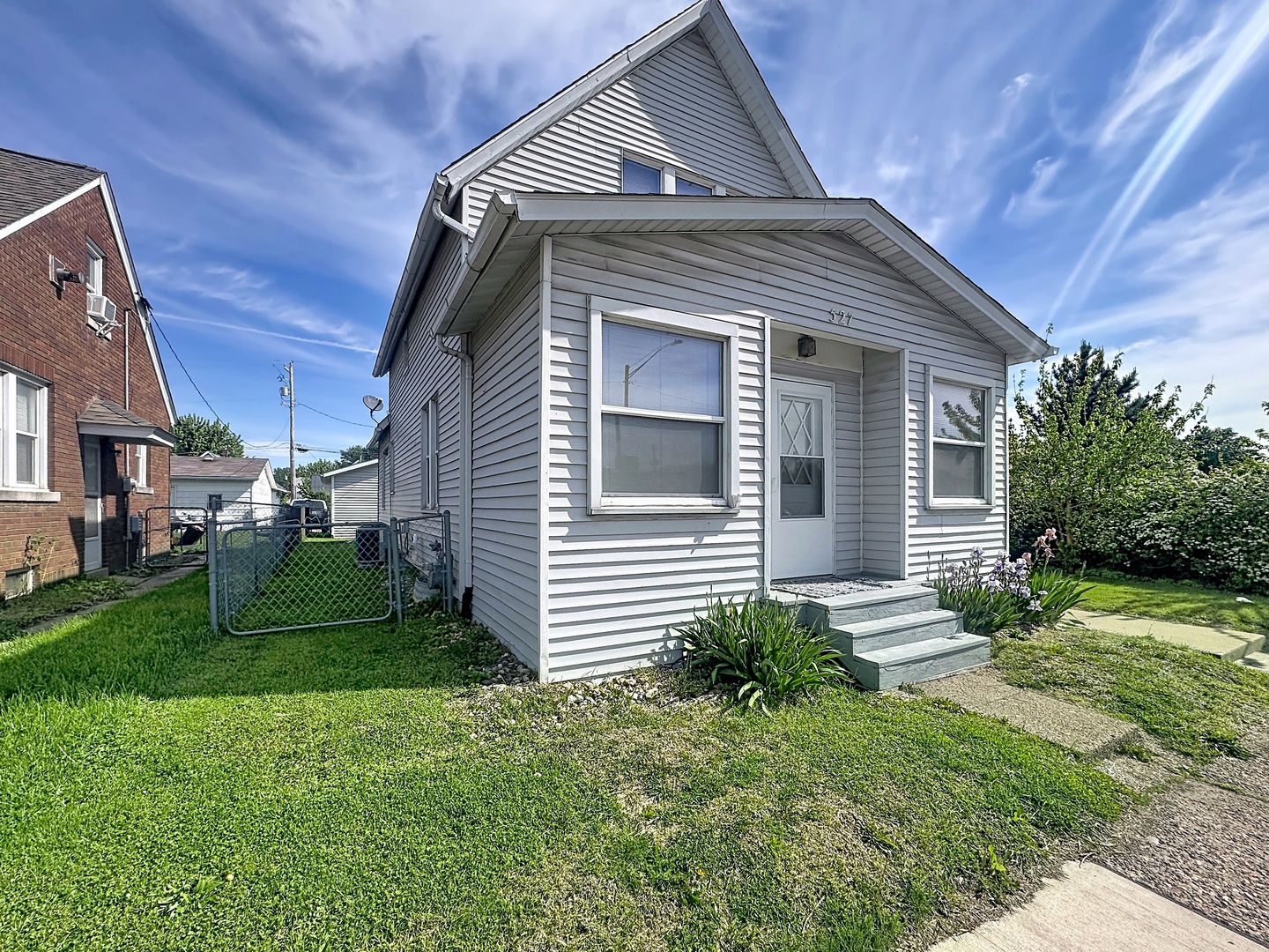 527 19th Avenue Moline, IL 61265 - Photo 2 of 21 a view of a house with a yard