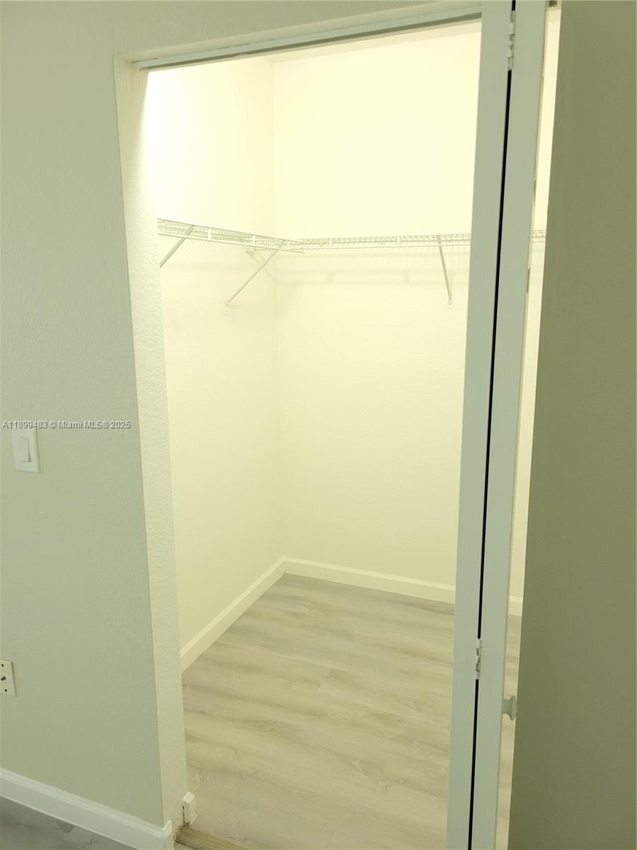 2556 Southwest 83rd Avenue, Unit 101 Miramar, FL 33025 - Photo 11 of 19 a bathroom with a window