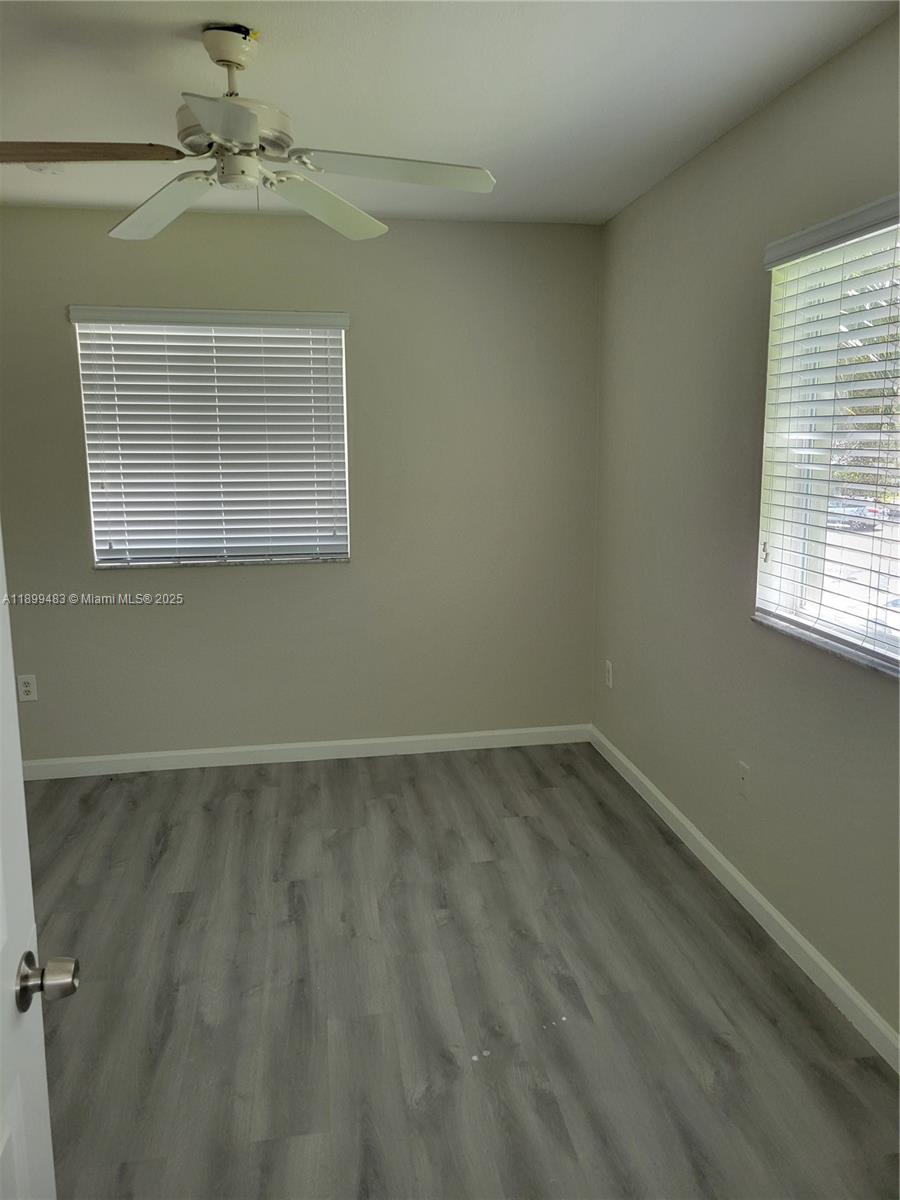2556 Southwest 83rd Avenue, Unit 101 Miramar, FL 33025 - Photo 15 of 19 an empty room with a window