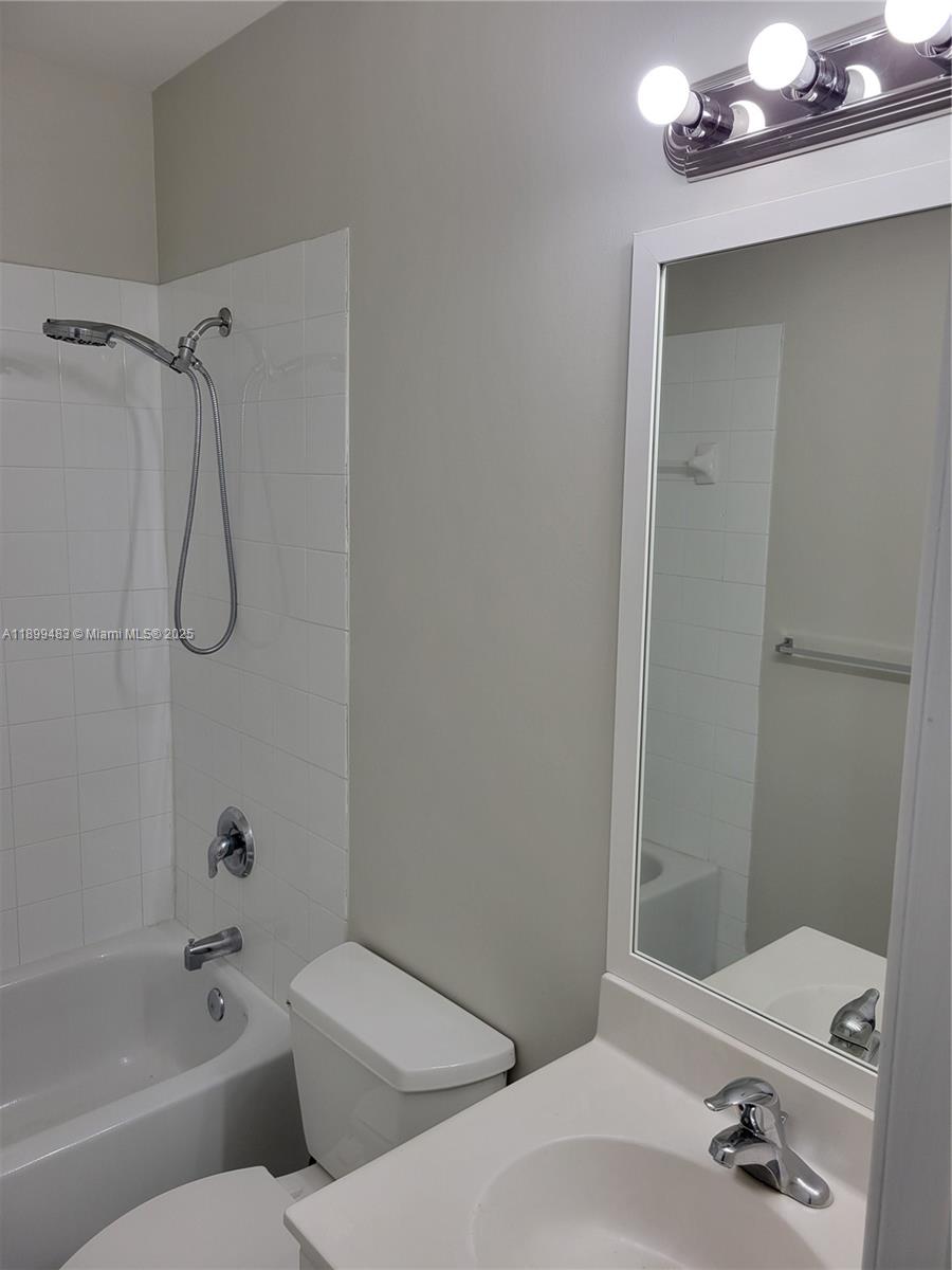 2556 Southwest 83rd Avenue, Unit 101 Miramar, FL 33025 - Photo 17 of 19 a bathroom with a bathtub and shower