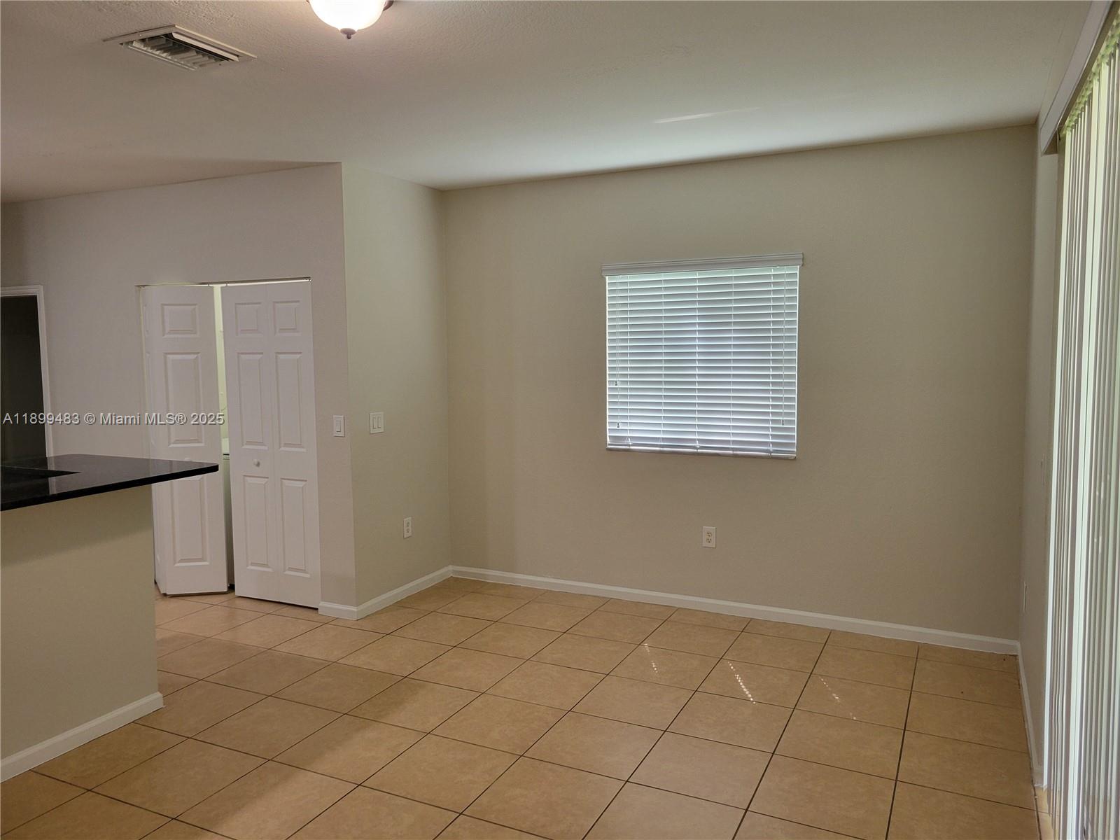 2556 Southwest 83rd Avenue, Unit 101 Miramar, FL 33025 - Photo 7 of 19 a view of an empty room