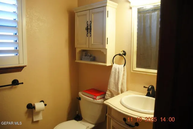 a bathroom with a sink and a toilet