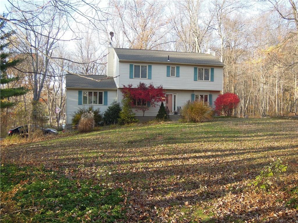 22 Skyview Road Monroe, CT 06468 - Photo 1 of 1 a view of a white house next to a yard with big trees